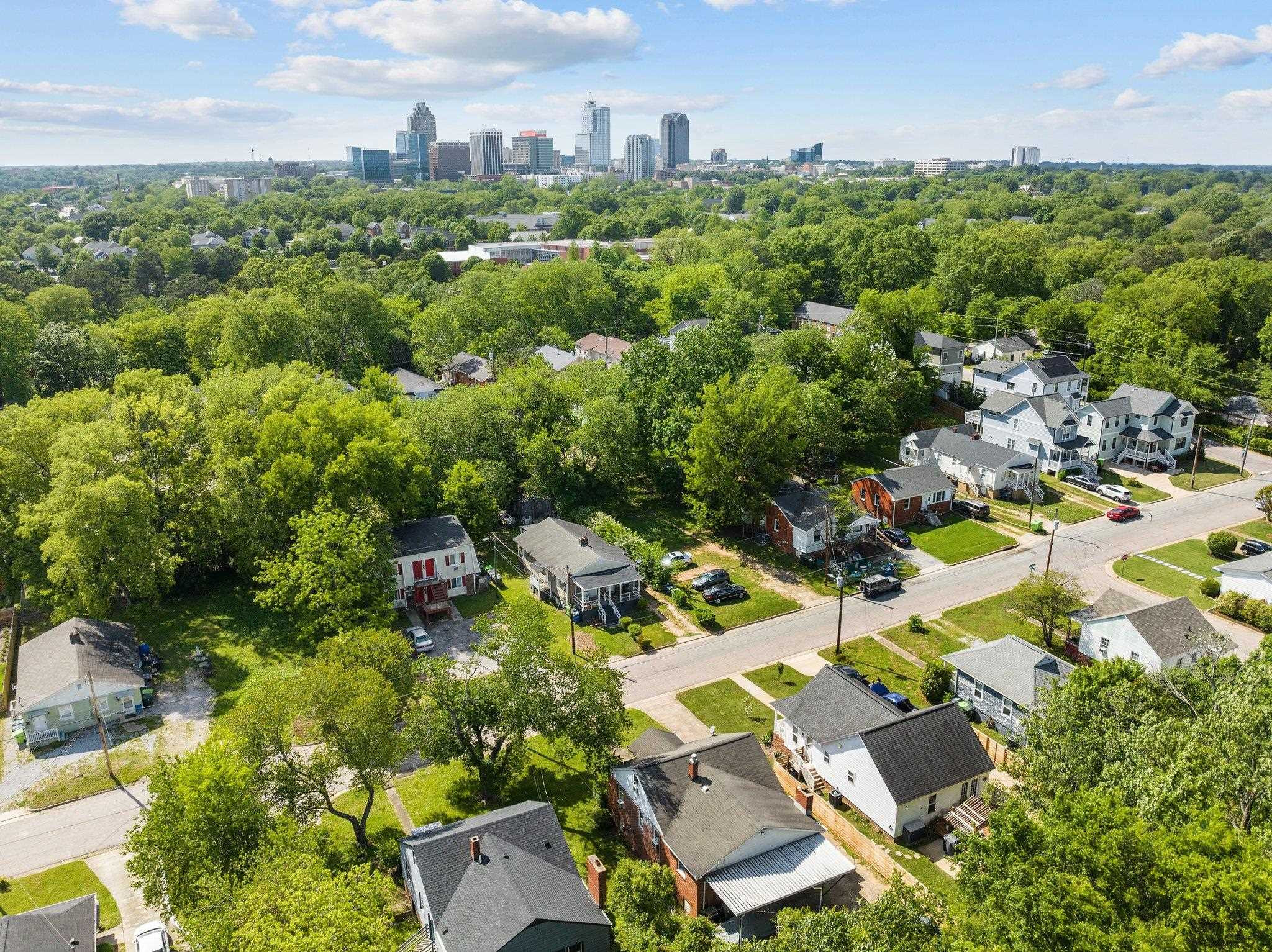 809 Coleman Street Raleigh, NC 27610 - Photo 41 of 70 an aerial view of residential house with outdoor space and trees all around