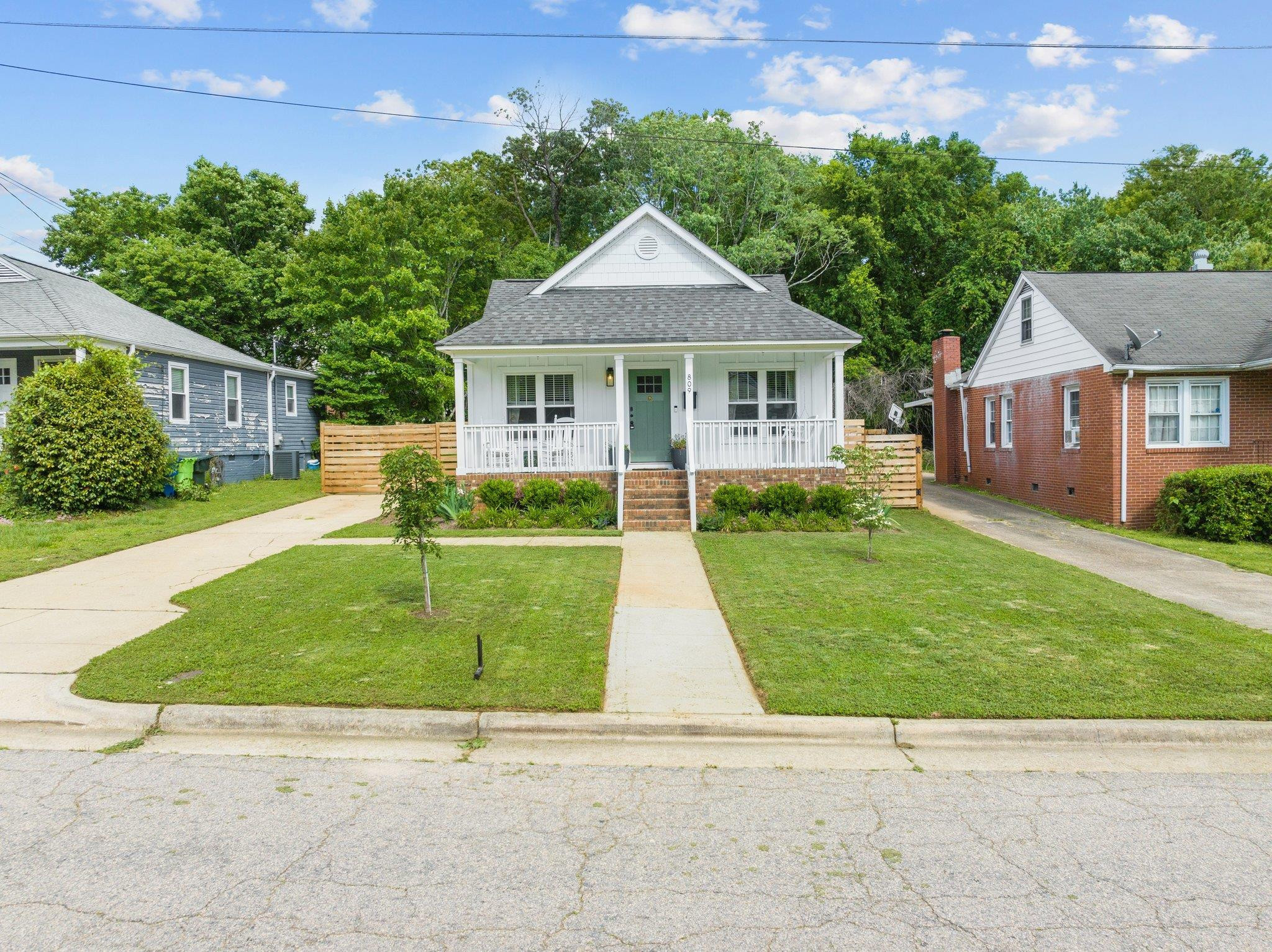 809 Coleman Street Raleigh, NC 27610 - Photo 49 of 70 front view of a house with a yard