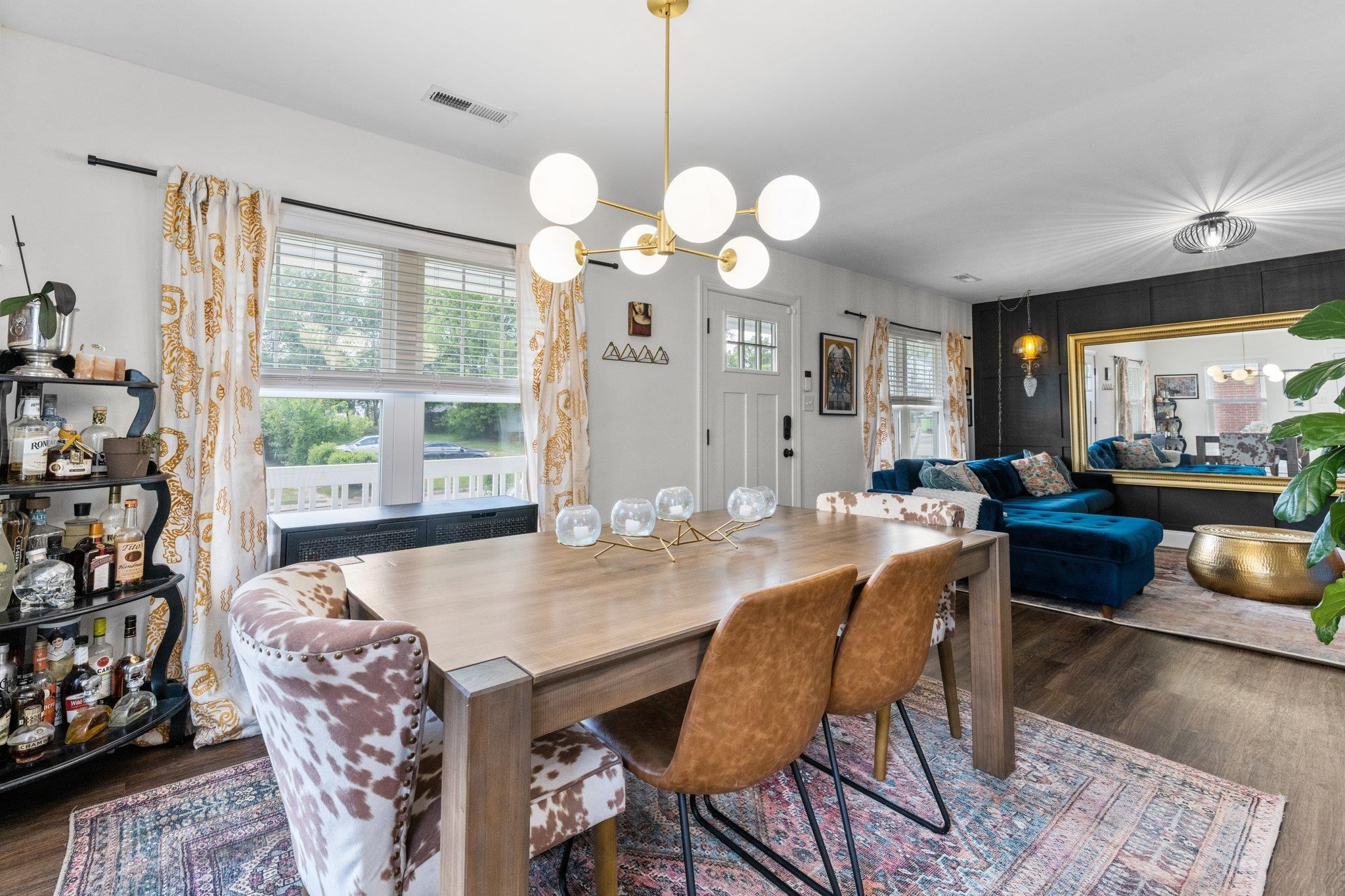 809 Coleman Street Raleigh, NC 27610 - Photo 5 of 70 a view of a dining room with furniture window and wooden floor