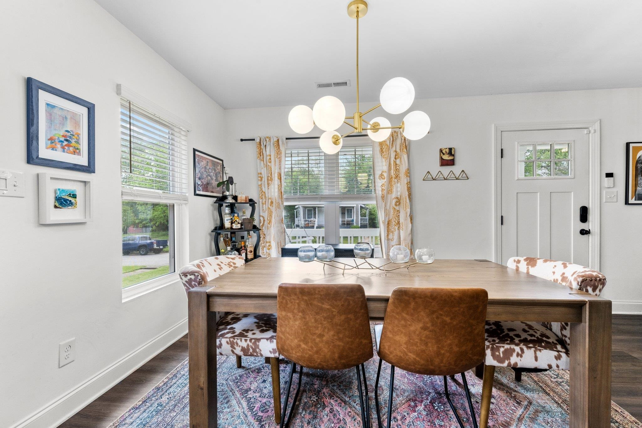 809 Coleman Street Raleigh, NC 27610 - Photo 6 of 70 a view of a dining room with furniture window and wooden floor