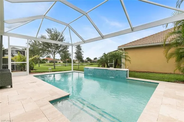 a view of a swimming pool with a porch