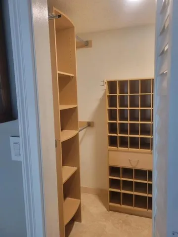 a utility room with washing machine