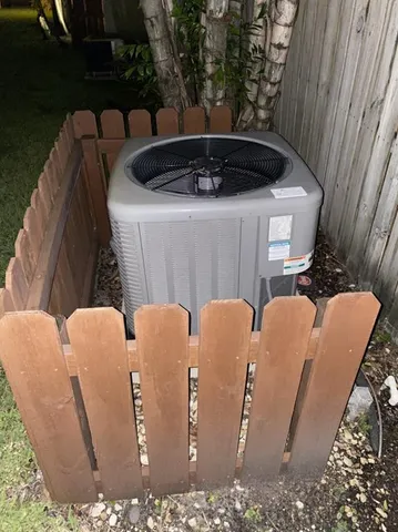 an aerial view of a house with garden space and street view