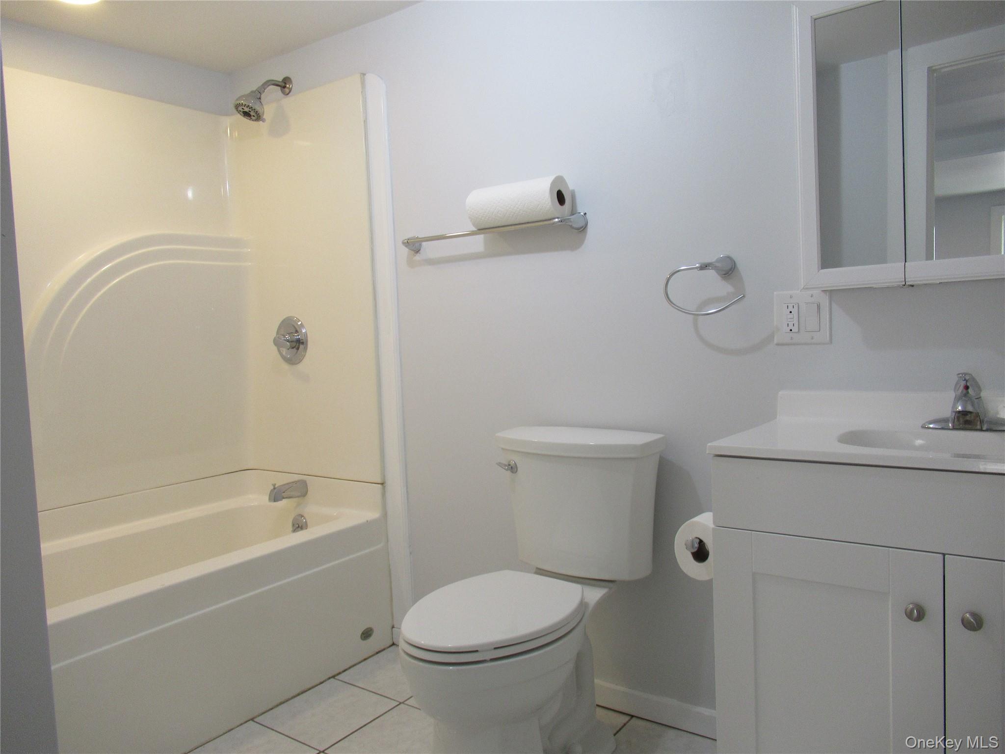 300 Old Rte 55, Unit 5 Poughquag, NY 12570 - Photo 12 of 20 a bathroom with a sink toilet and shower