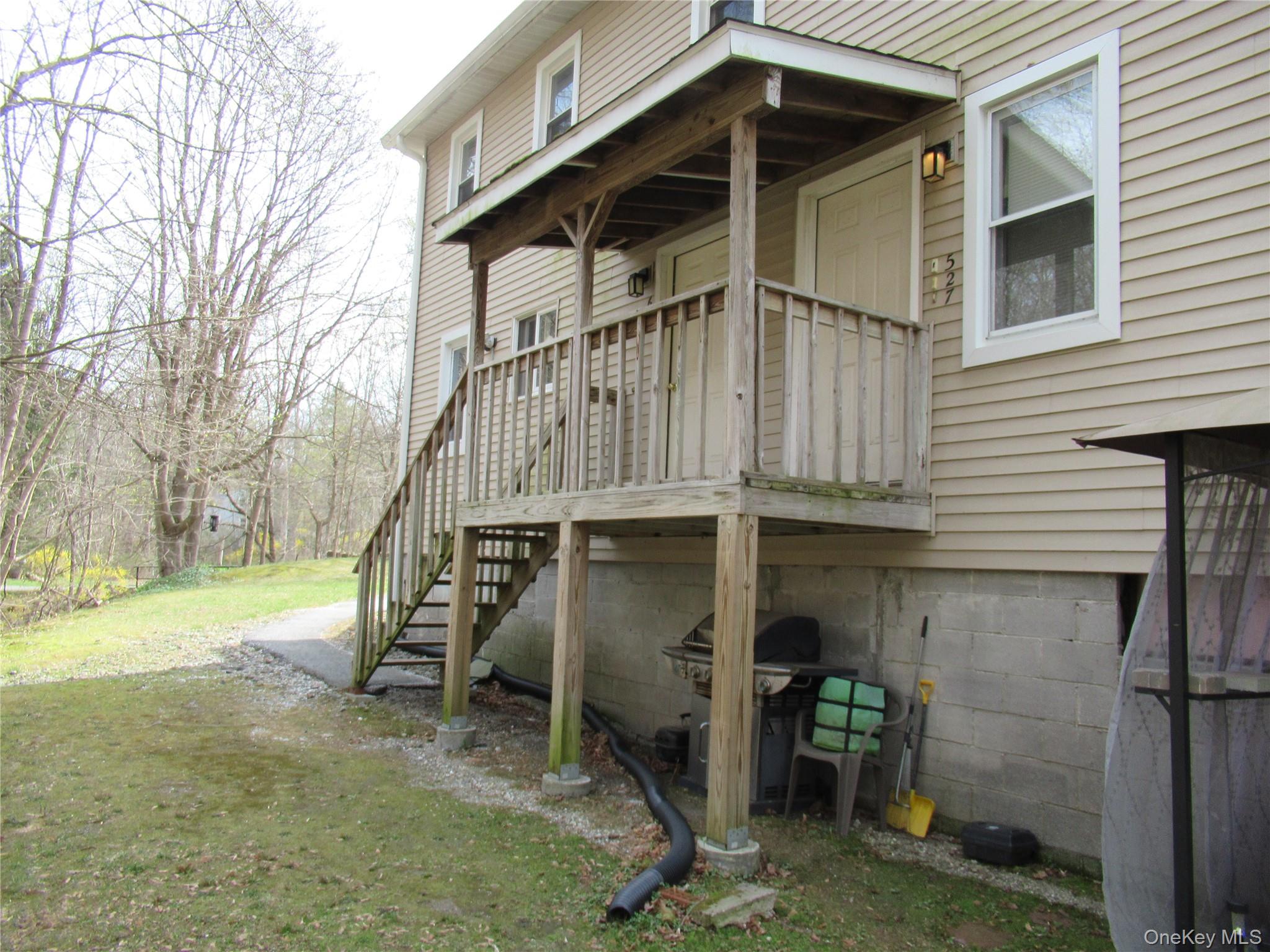 300 Old Rte 55, Unit 5 Poughquag, NY 12570 - Photo 18 of 20 a view of a house with a yard