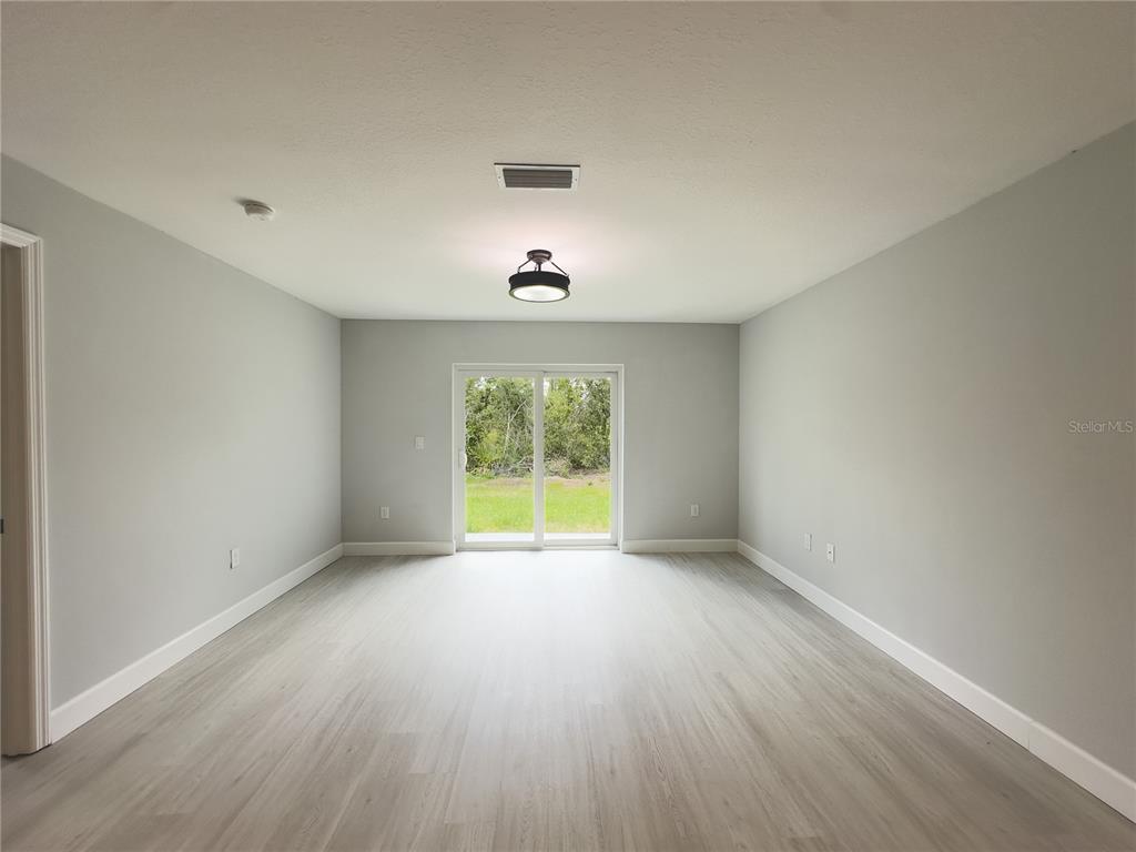 3602 Gillot Boulevard Port Charlotte, FL 33981 - Photo 22 of 28 a view of an empty room with a window