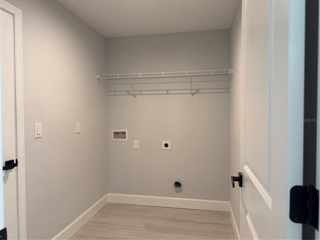 3602 Gillot Boulevard Port Charlotte, FL 33981 - Photo 26 of 28 a view of a room with wooden floor