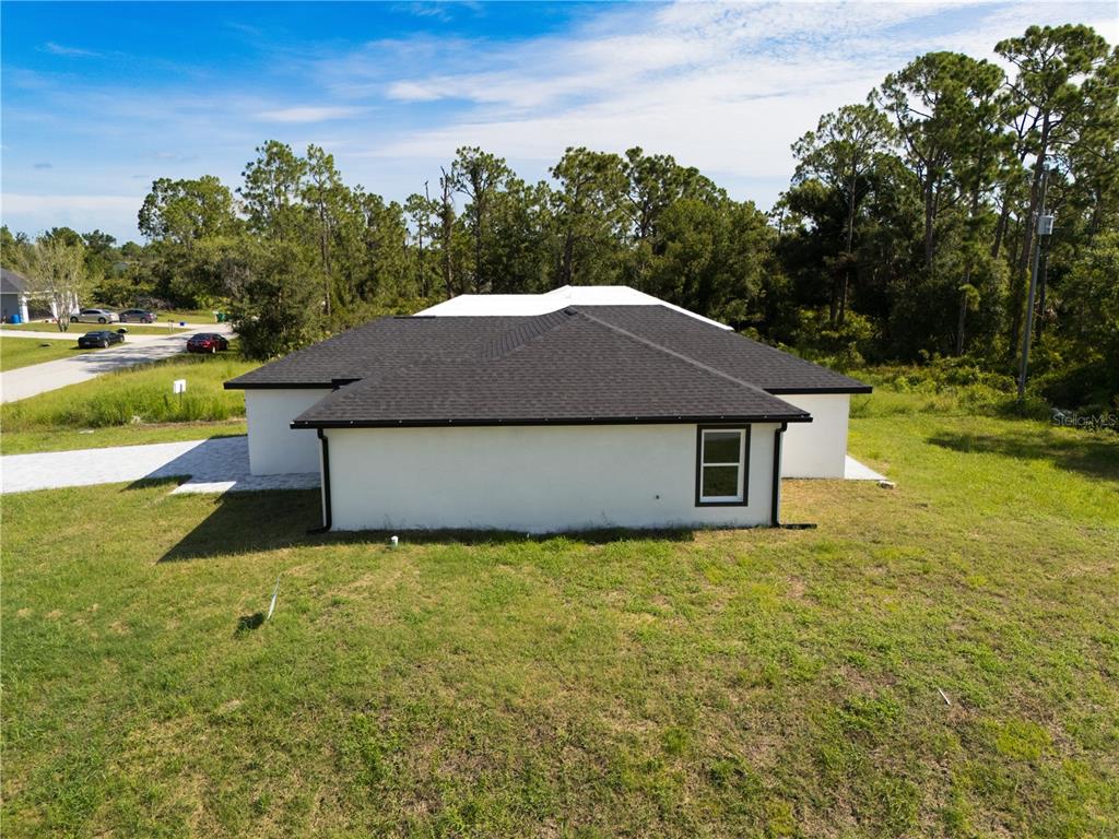 3602 Gillot Boulevard Port Charlotte, FL 33981 - Photo 5 of 28 a view of a house with a yard