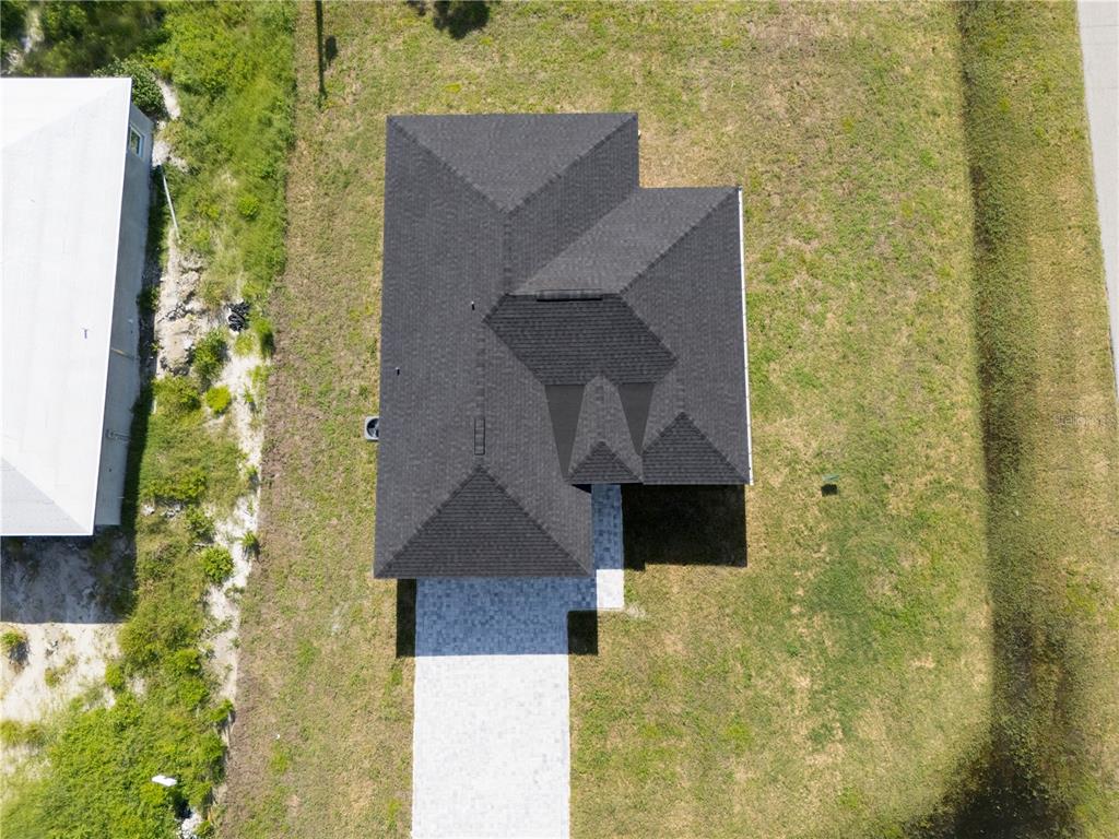 3602 Gillot Boulevard Port Charlotte, FL 33981 - Photo 6 of 28 a aerial view of a house with a yard