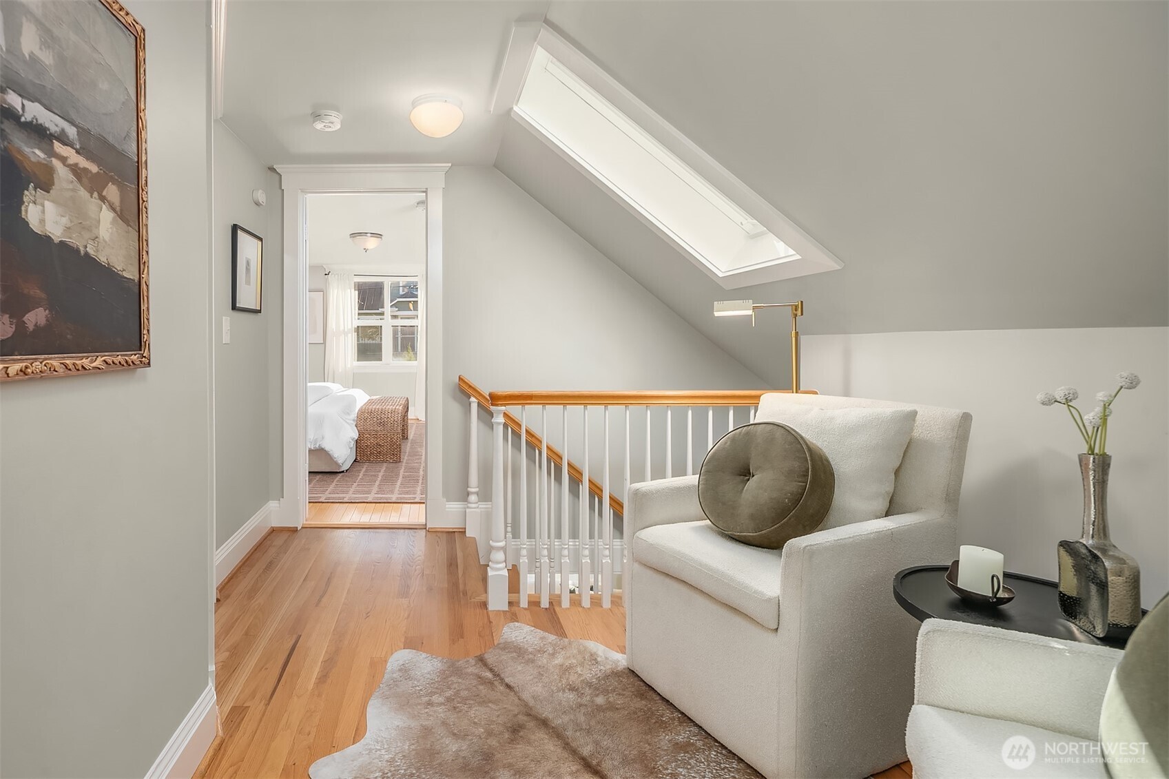 902 North 93rd Street Seattle, WA 98103 - Photo 13 of 34 a living room with furniture and a wooden floor