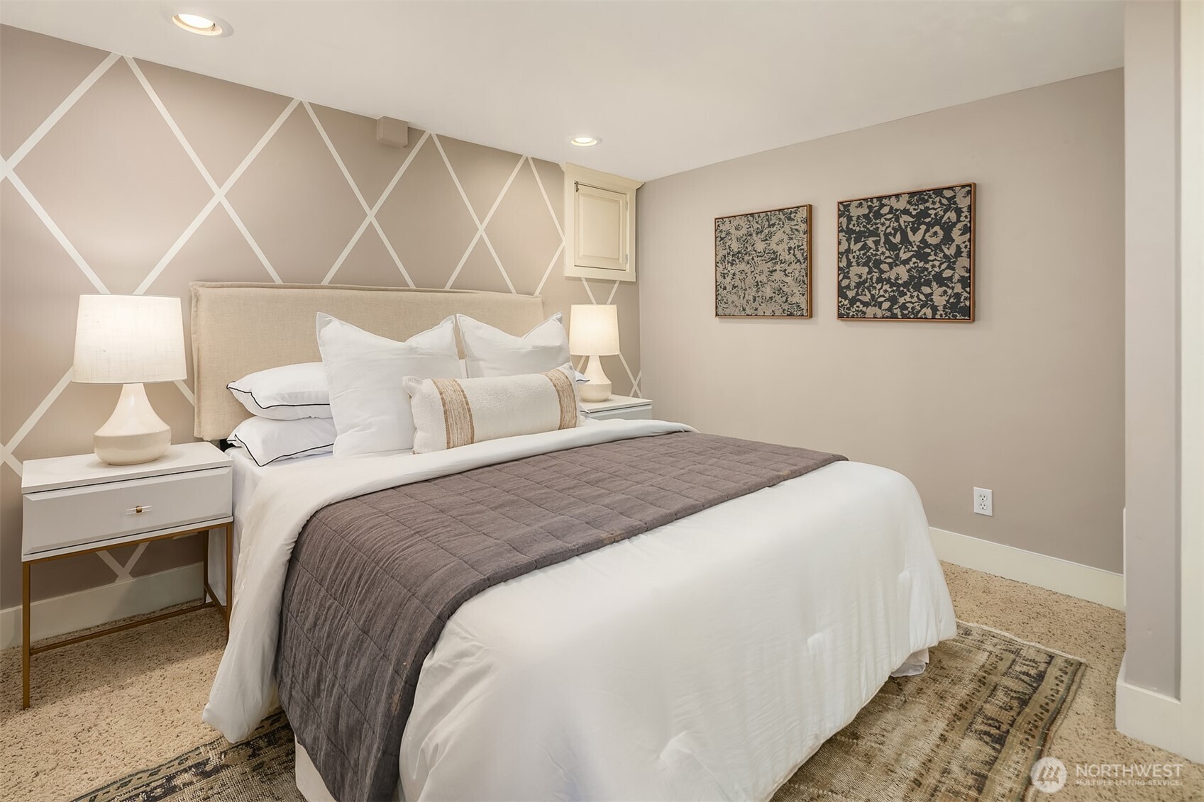 902 North 93rd Street Seattle, WA 98103 - Photo 19 of 34 a bedroom with a large bed and a couch