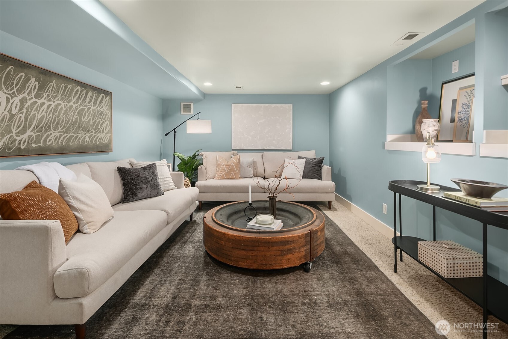 902 North 93rd Street Seattle, WA 98103 - Photo 20 of 34 a living room with furniture a window and a lamp