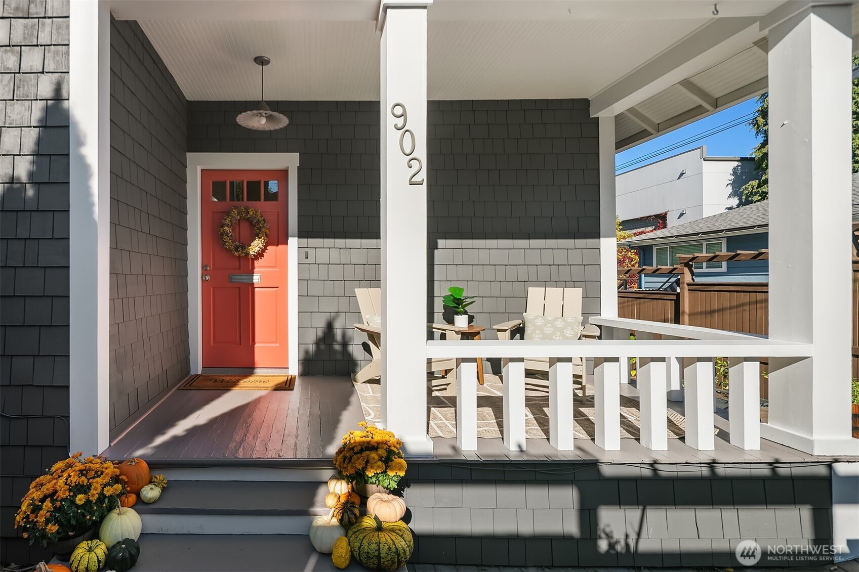 902 North 93rd Street Seattle, WA 98103 - Photo 2 of 34 a front view of a house with wooden floor