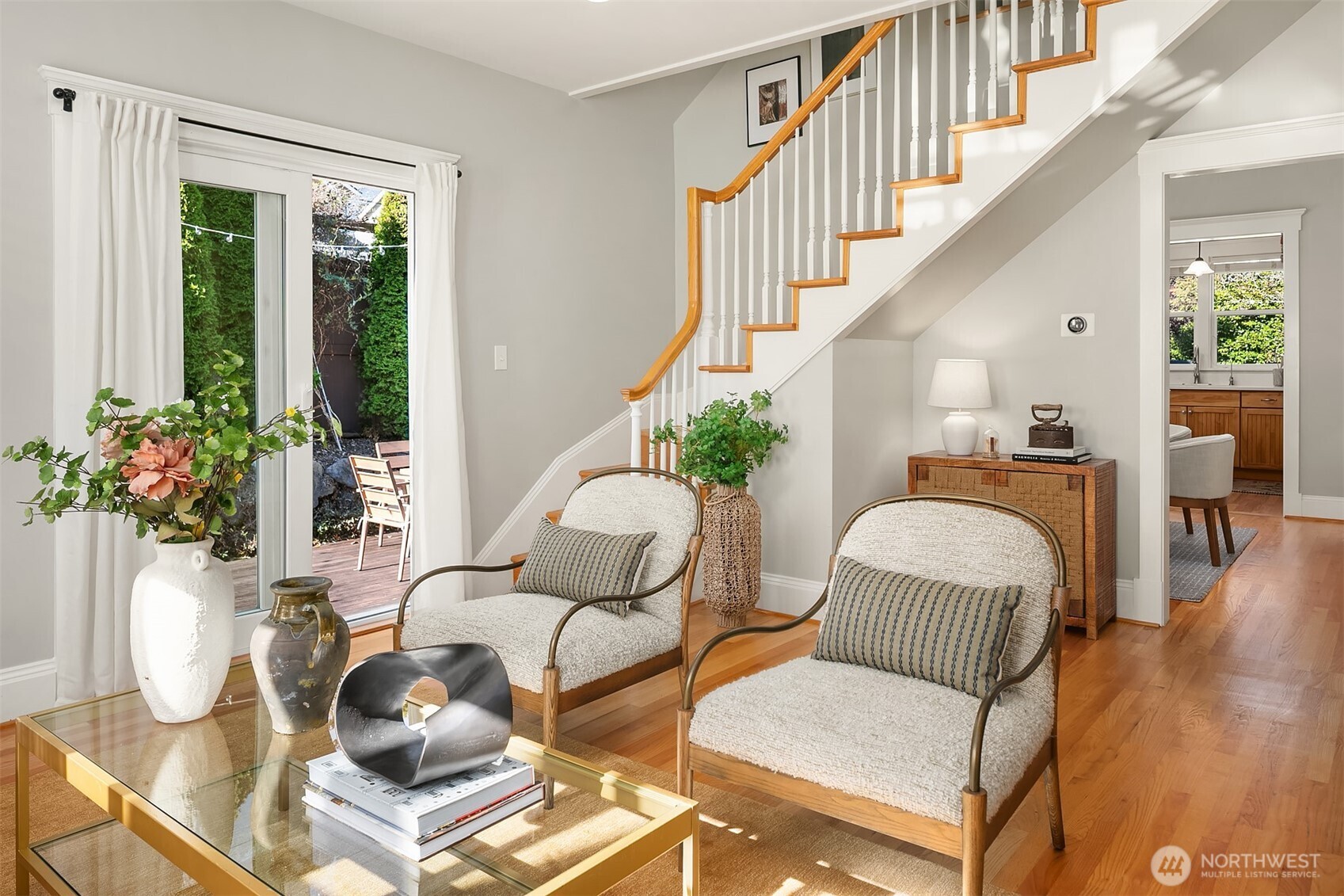 902 North 93rd Street Seattle, WA 98103 - Photo 5 of 34 a living room with furniture and a potted plant