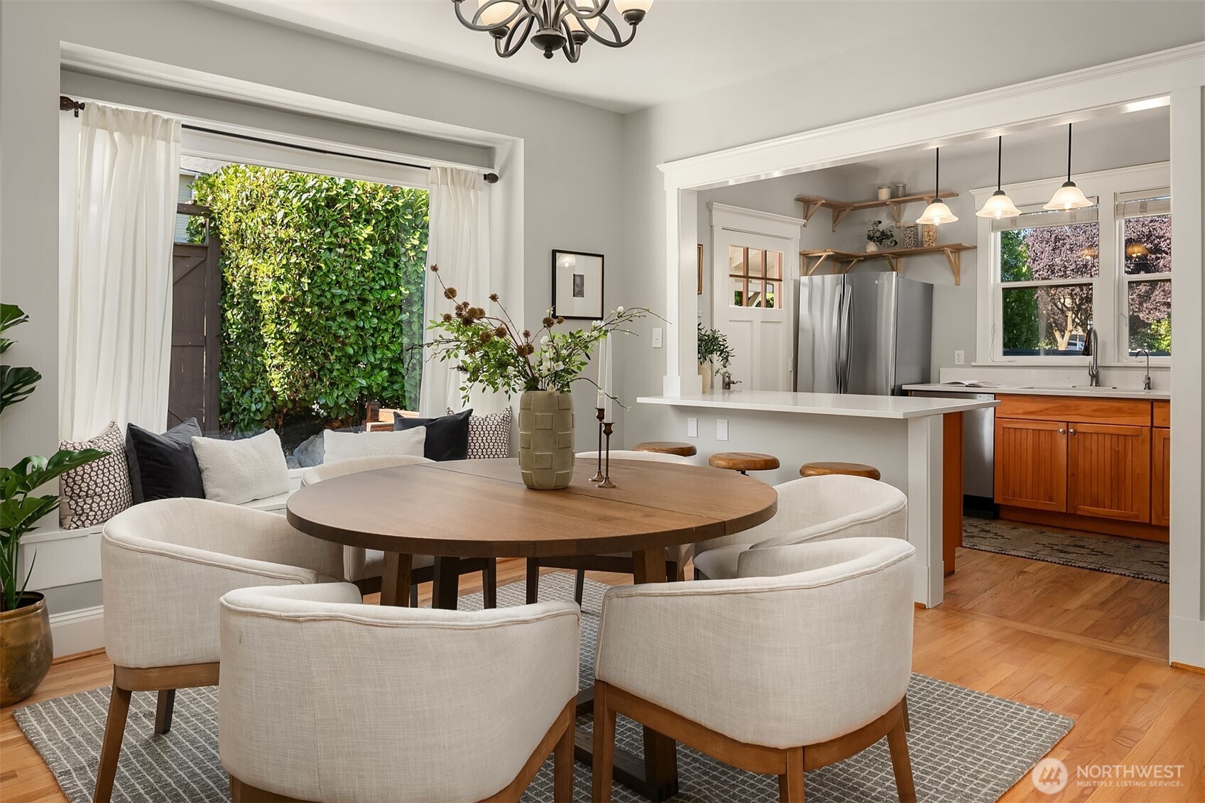 902 North 93rd Street Seattle, WA 98103 - Photo 7 of 34 a dining room with furniture and window