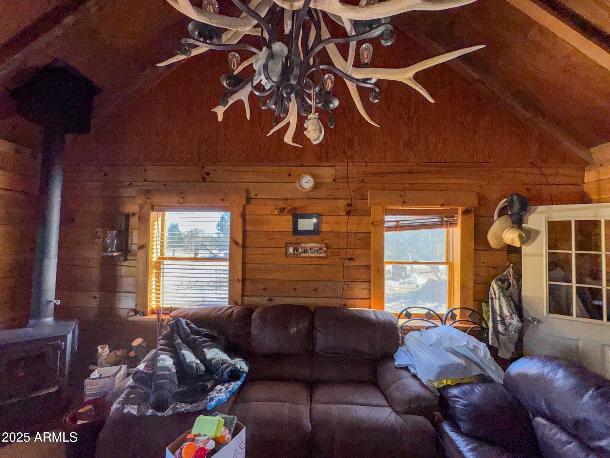 5823 Cattle Guard Road Williams, AZ 86046 - Photo 22 of 48 a living room with furniture and a window