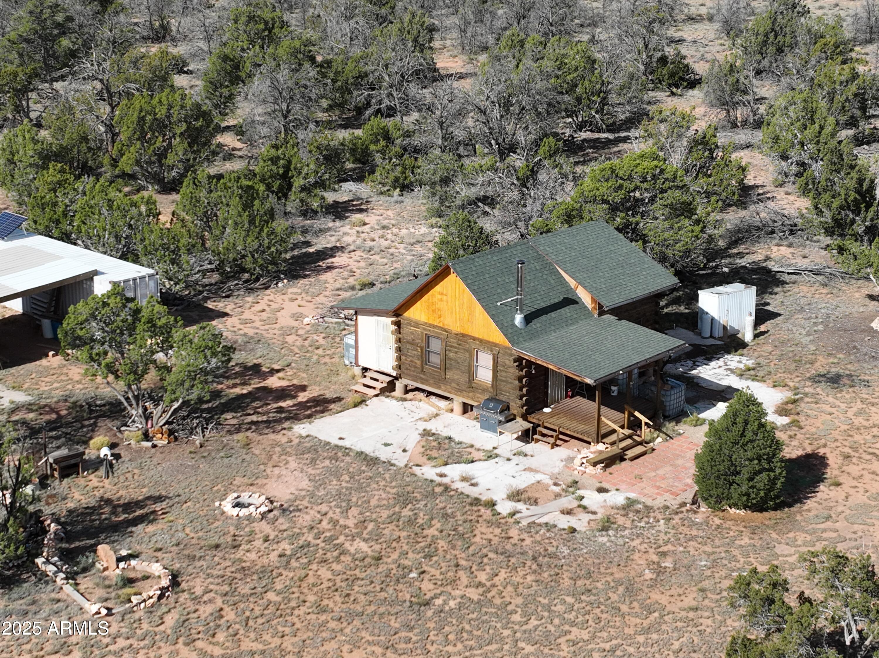 5823 Cattle Guard Road Williams, AZ 86046 - Photo 3 of 48 an aerial view of a house with yard and staircase