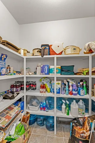 a view of a dining room with furniture large window and wooden floor