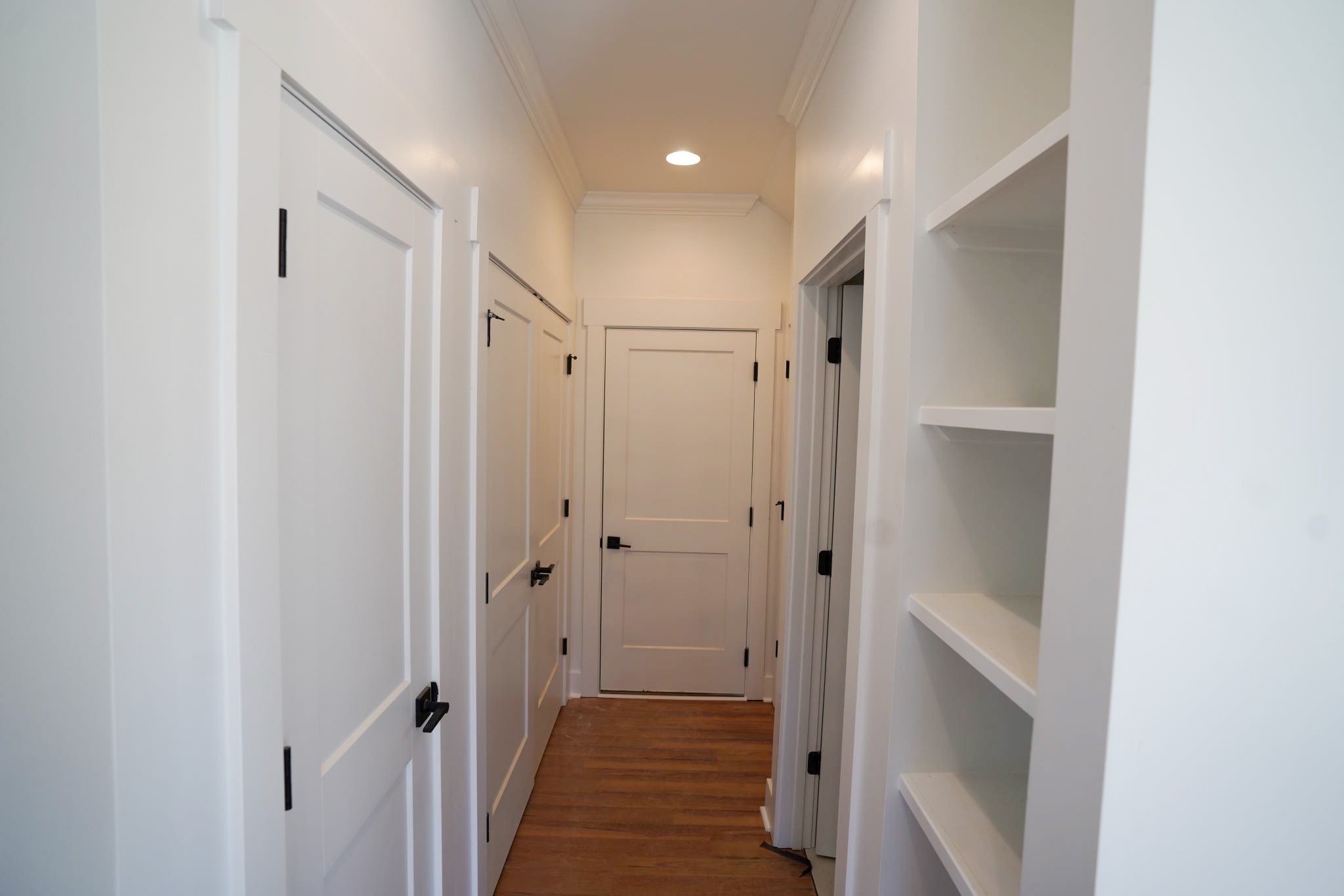 943 Overlook Trail Stewart, TN 37175 - Photo 19 of 35 a view of a hallway with wooden floor