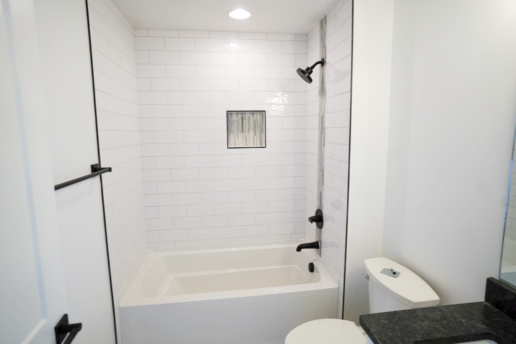 943 Overlook Trail Stewart, TN 37175 - Photo 25 of 35 a bathroom with a bathtub and shower