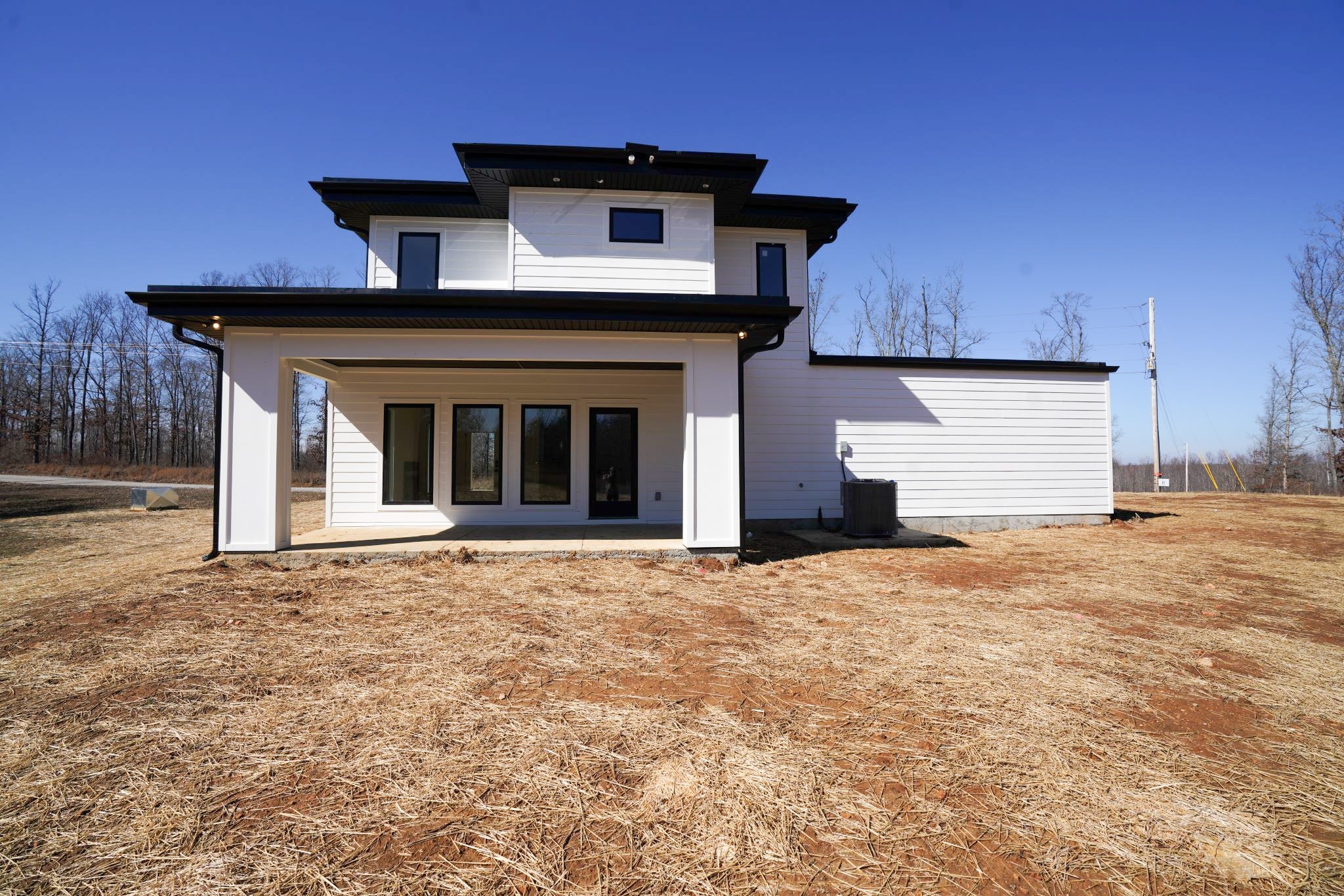 943 Overlook Trail Stewart, TN 37175 - Photo 10 of 35 a front view of a house with a yard and garage