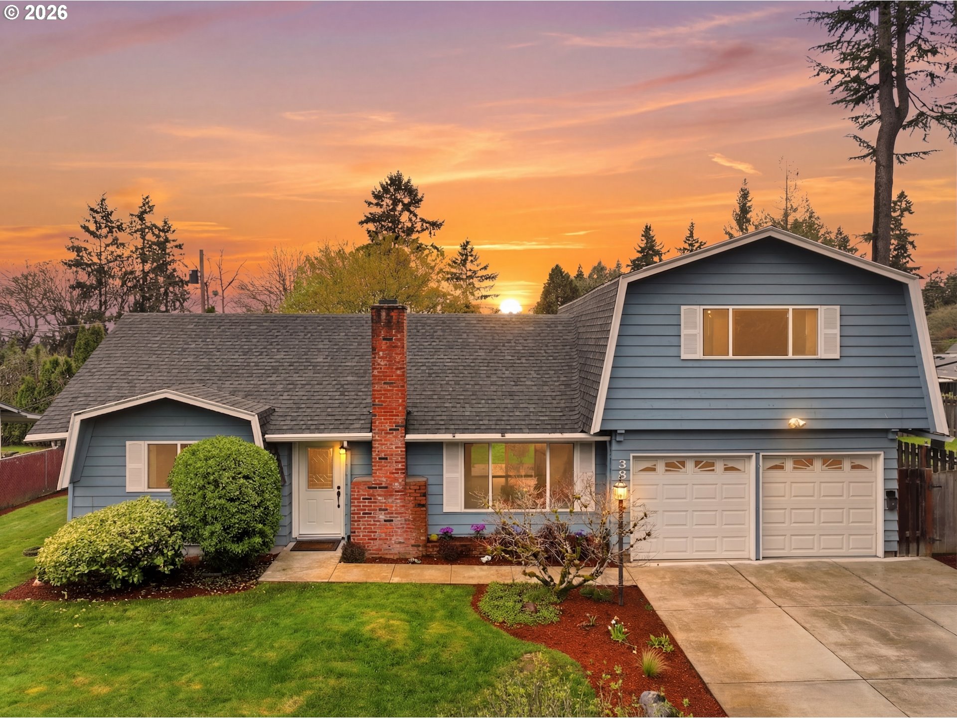 335 Southwest 141st Avenue Beaverton, OR 97006 - Photo 1 of 42 a front view of a house with a yard and trees