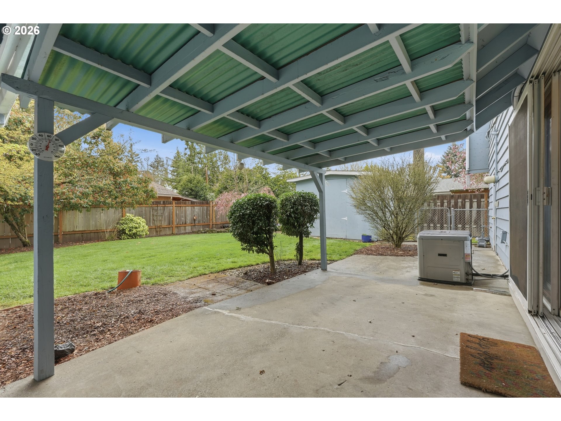 335 Southwest 141st Avenue Beaverton, OR 97006 - Photo 30 of 42 a view of a backyard with wooden floor and porch