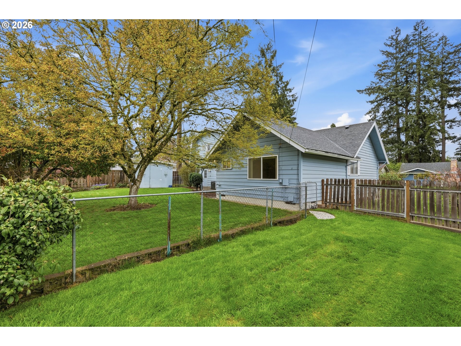 335 Southwest 141st Avenue Beaverton, OR 97006 - Photo 35 of 42 a view of a house with backyard and sitting area