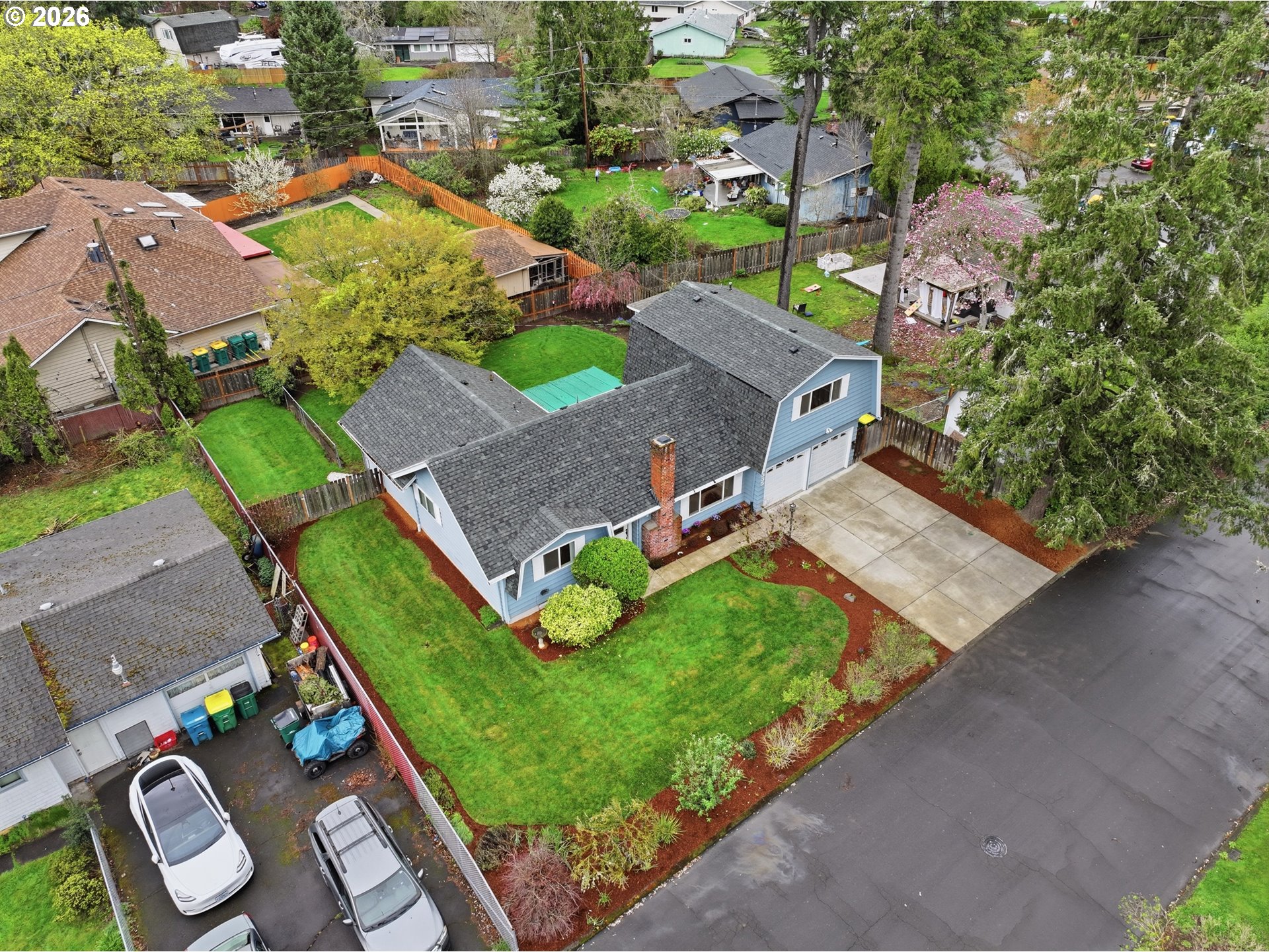 335 Southwest 141st Avenue Beaverton, OR 97006 - Photo 39 of 42 an aerial view of multiple houses with yard