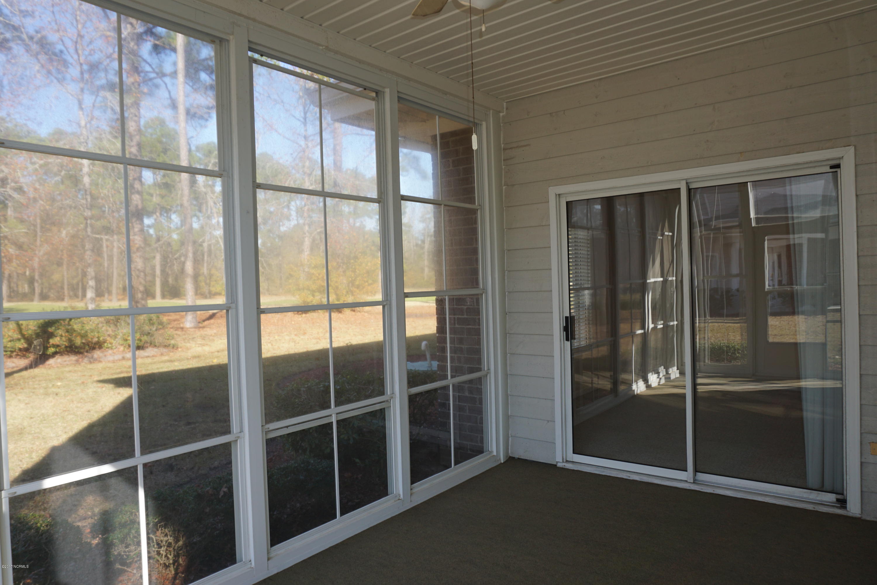 122 Rice Mill Circle, Unit 1 Sunset Beach, NC 28468 - Photo 16 of 33 Screened Porch