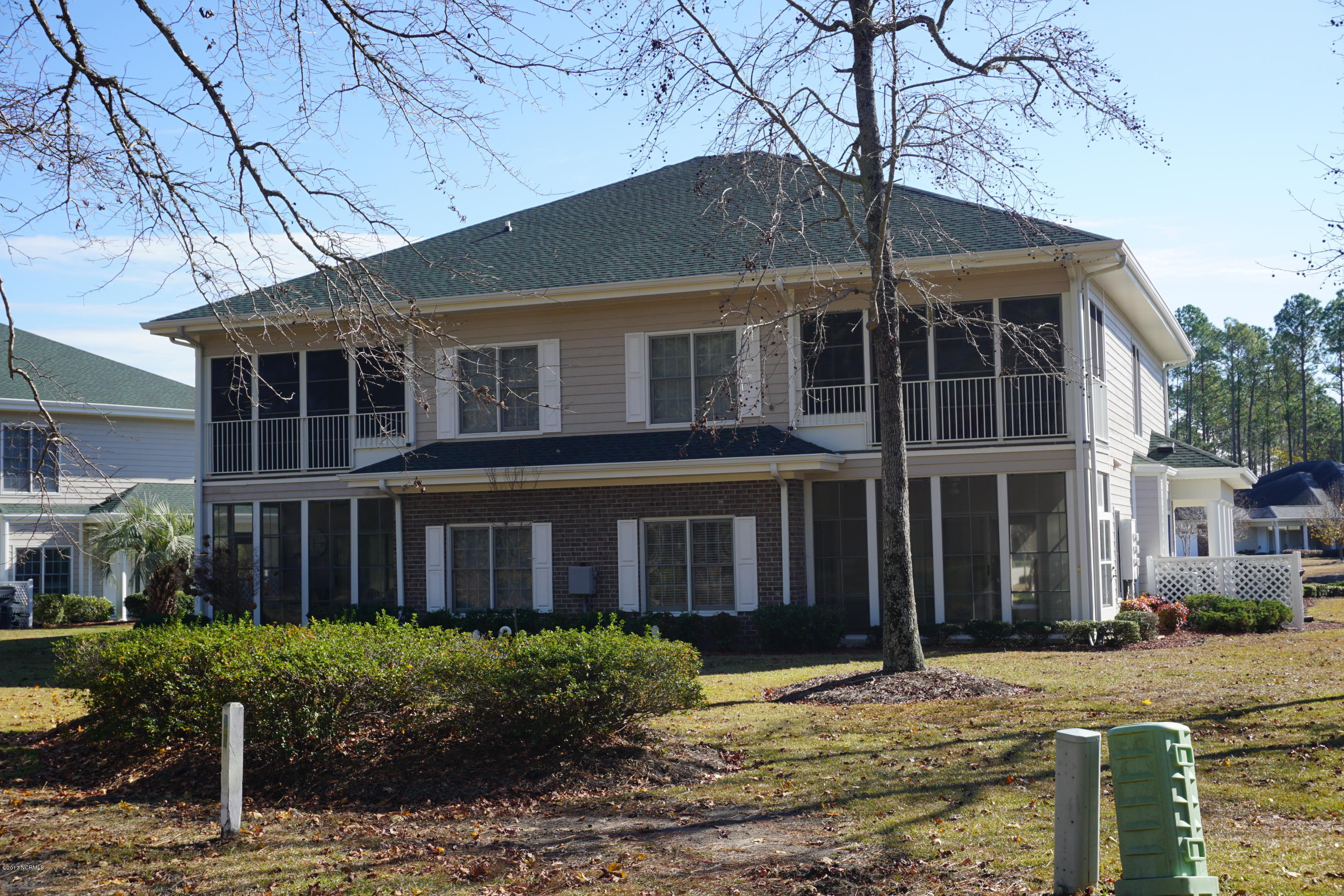 122 Rice Mill Circle, Unit 1 Sunset Beach, NC 28468 - Photo 17 of 33 Rear of Building