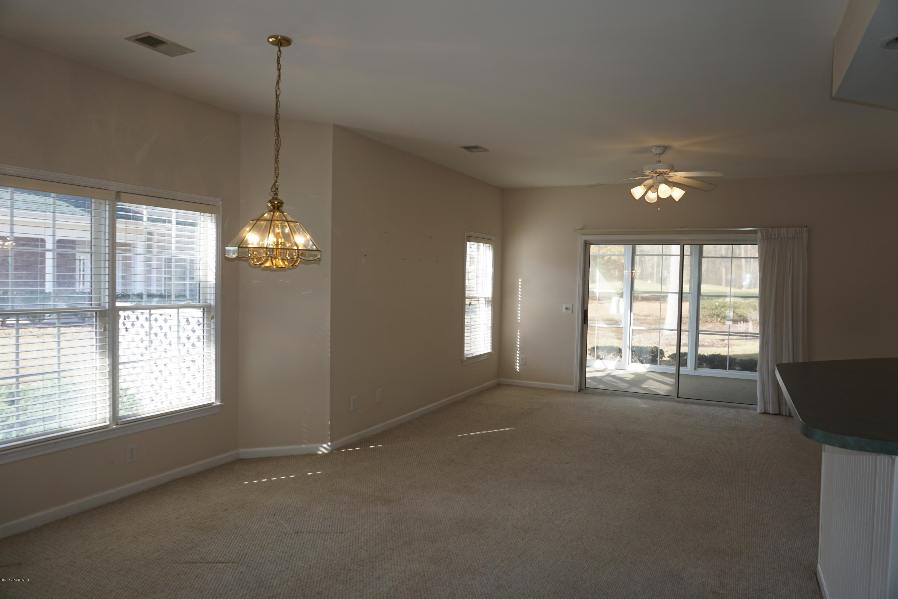 122 Rice Mill Circle, Unit 1 Sunset Beach, NC 28468 - Photo 10 of 33 Dining/Living Combo