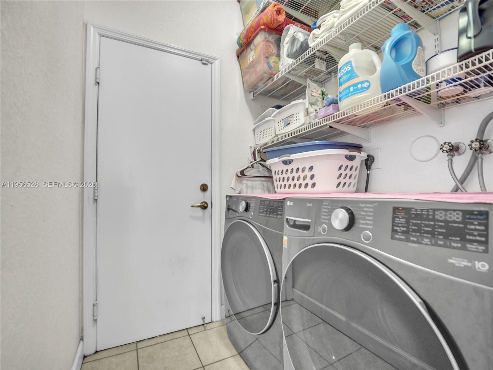 15541 Southwest 21st Terrace Miami, FL 33185 - Photo 13 of 34 a close up view of a washer and dryer