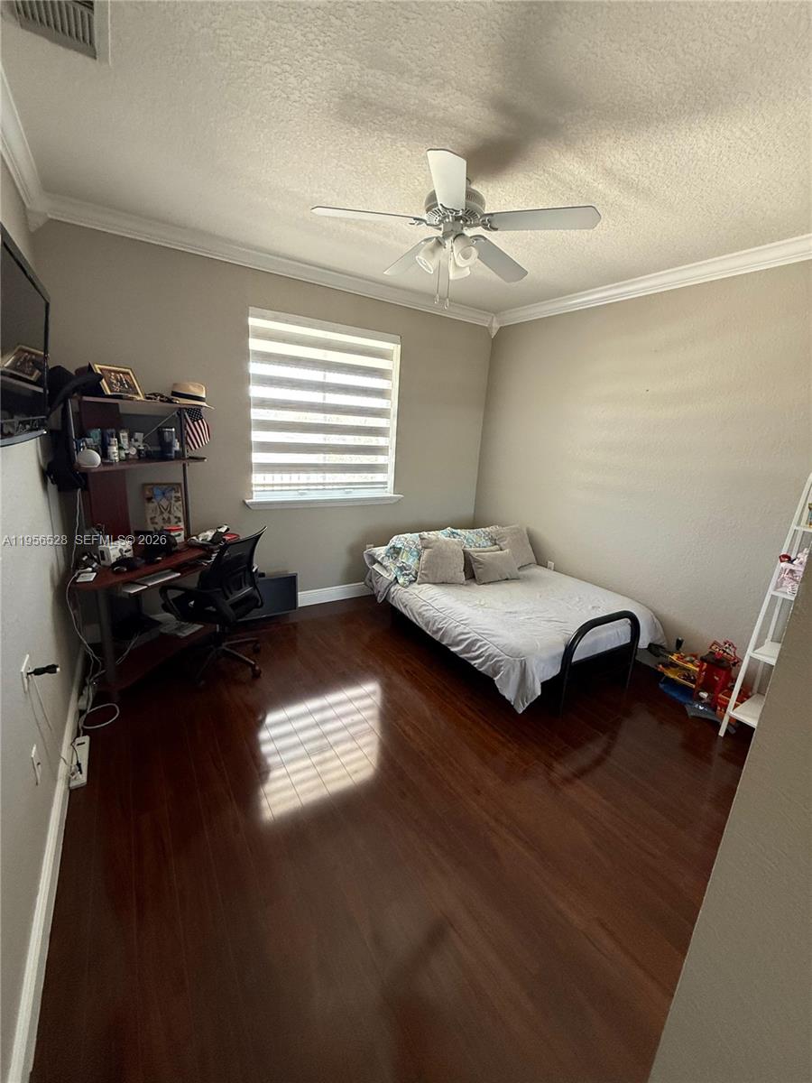 15541 Southwest 21st Terrace Miami, FL 33185 - Photo 15 of 21 a bedroom with bed and window