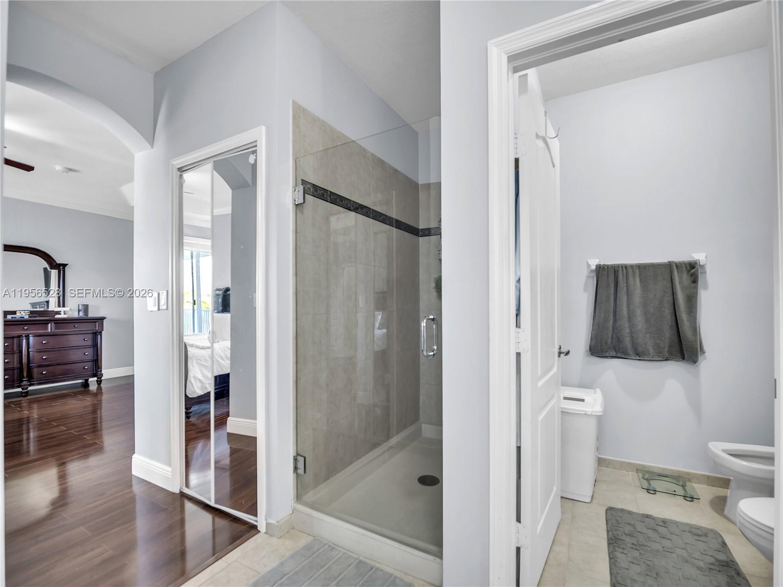 15541 Southwest 21st Terrace Miami, FL 33185 - Photo 20 of 34 a bathroom with a shower and a toilet