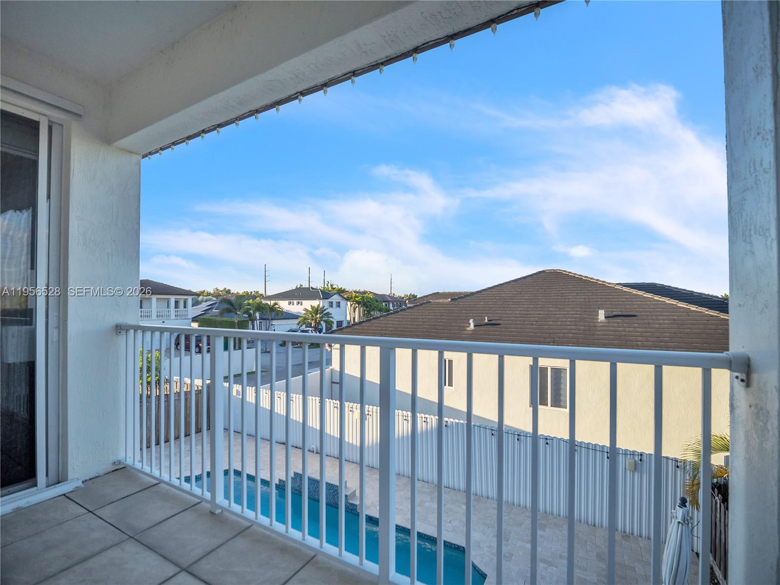 15541 Southwest 21st Terrace Miami, FL 33185 - Photo 24 of 34 a view of a houses with a balcony