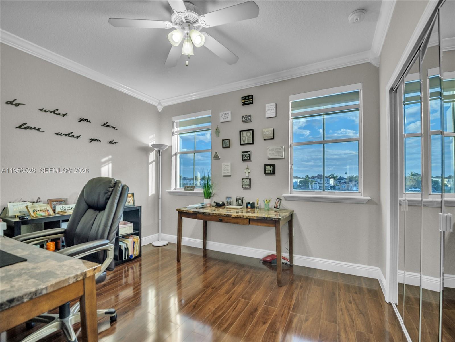 15541 Southwest 21st Terrace Miami, FL 33185 - Photo 25 of 34 a workspace with wooden floor