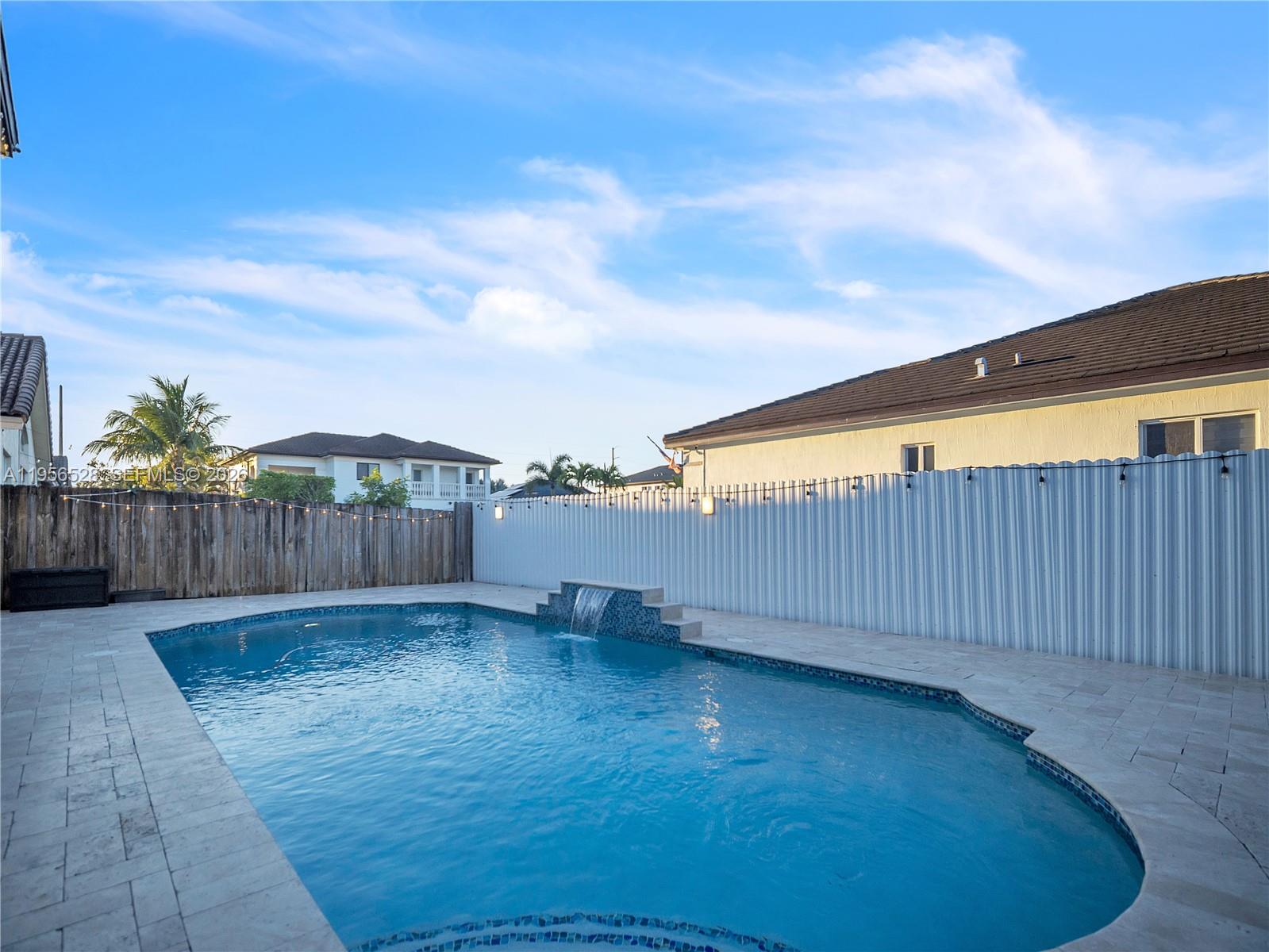 15541 Southwest 21st Terrace Miami, FL 33185 - Photo 32 of 34 a view of a backyard with wooden fence