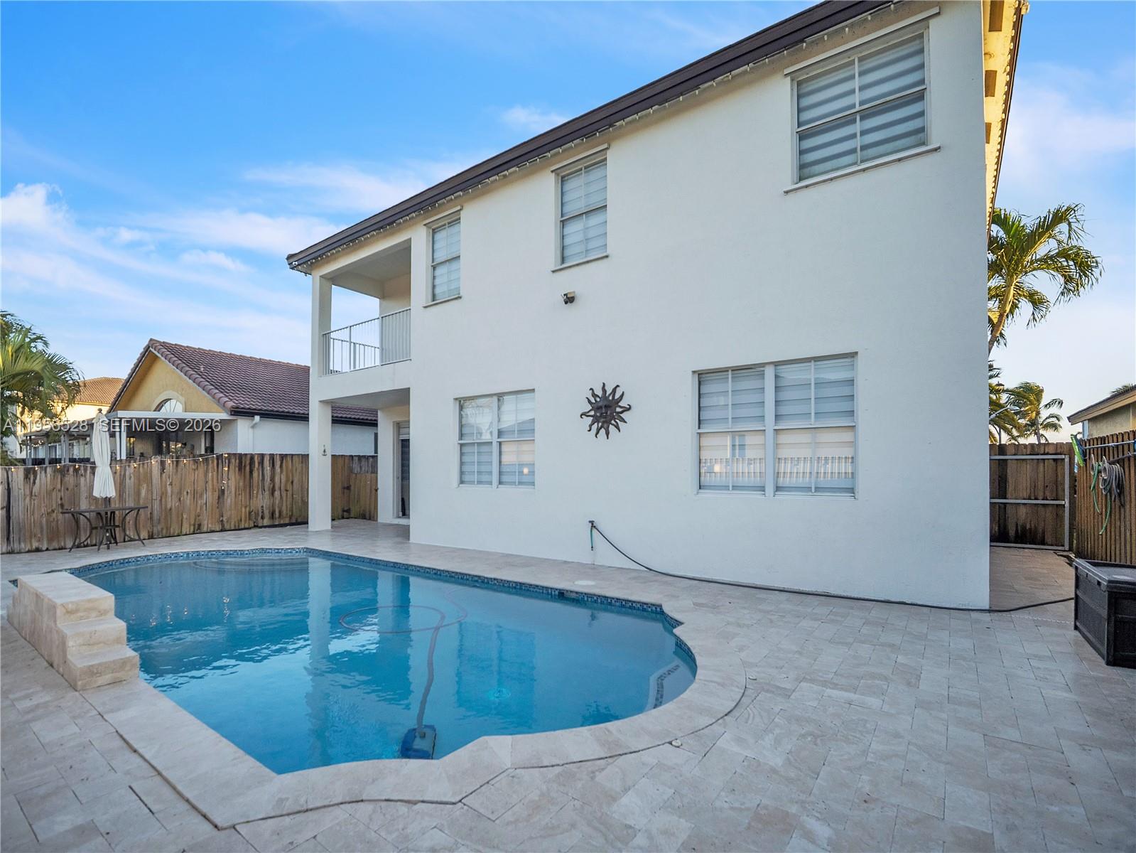 15541 Southwest 21st Terrace Miami, FL 33185 - Photo 33 of 34 a view of a house with a swimming pool