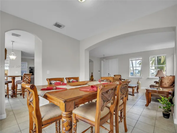 a view of a dining room with furniture