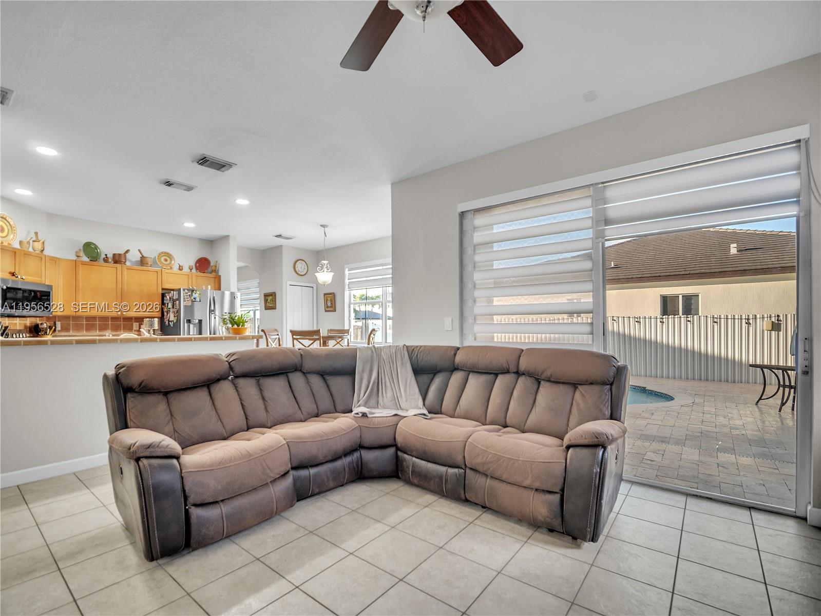 15541 Southwest 21st Terrace Miami, FL 33185 - Photo 10 of 34 a living room with furniture