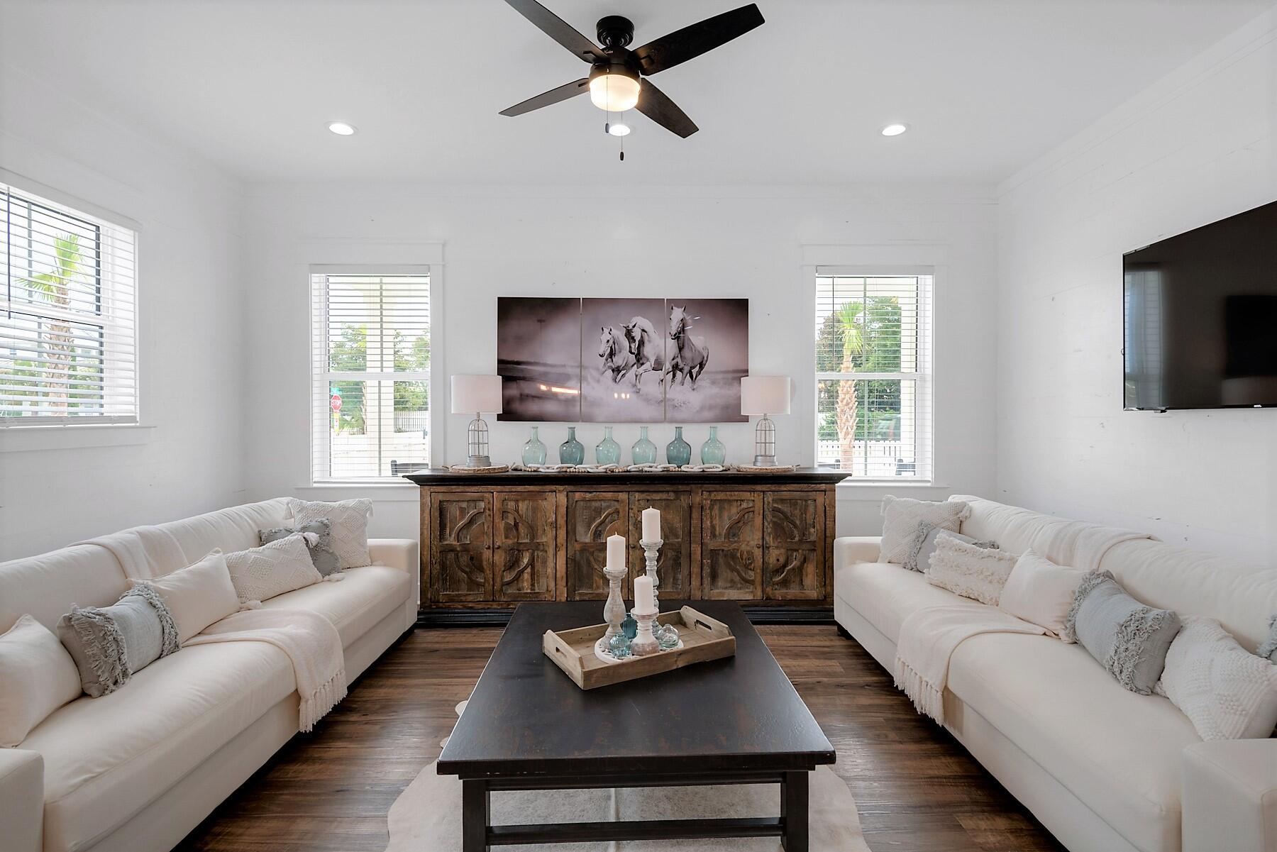 4458 Luke Avenue Destin, FL 32541 - Photo 13 of 41 a living room with furniture and a flat screen tv