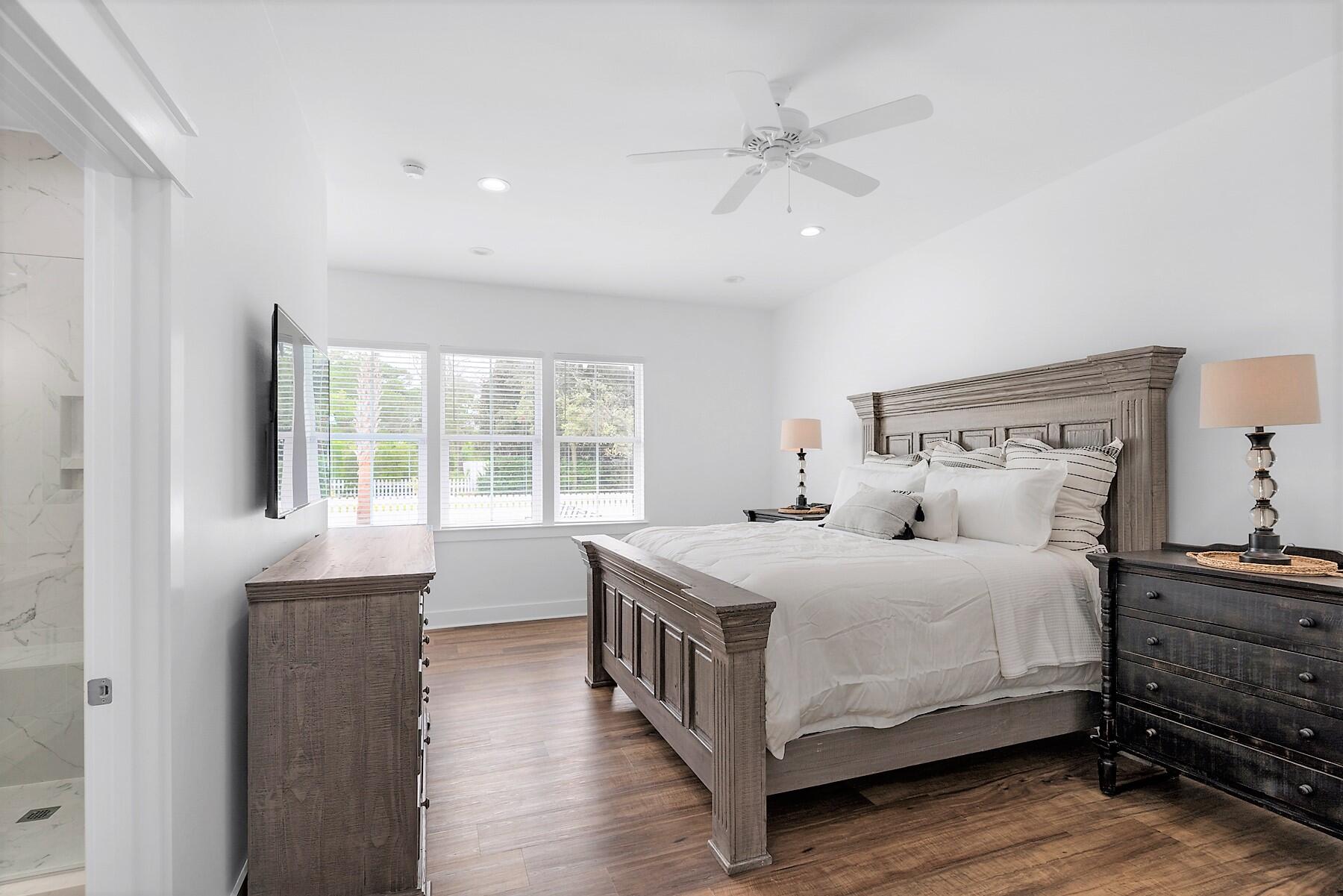 4458 Luke Avenue Destin, FL 32541 - Photo 18 of 41 a bedroom with a bed and window