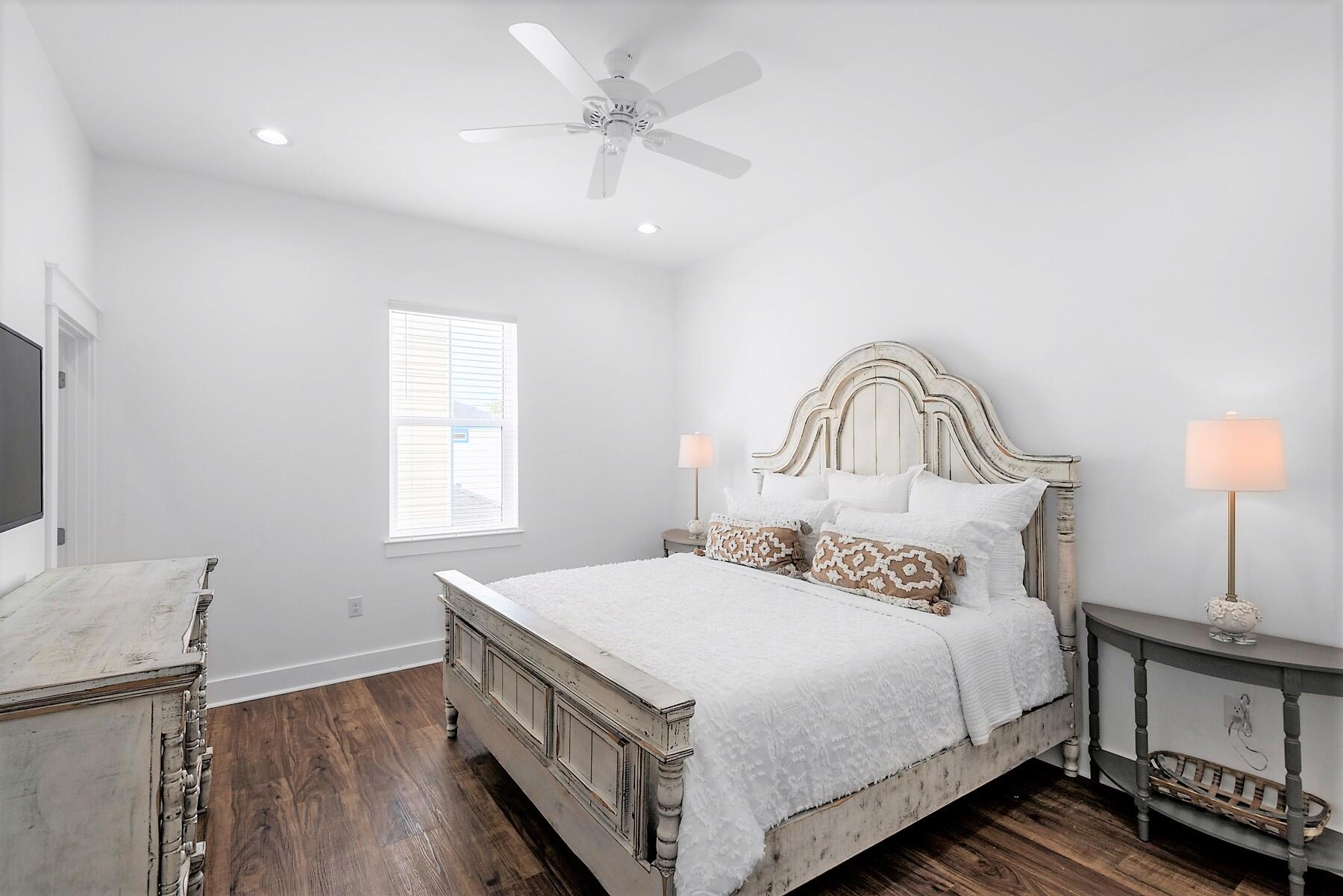 4458 Luke Avenue Destin, FL 32541 - Photo 25 of 41 a bedroom with a bed and a window