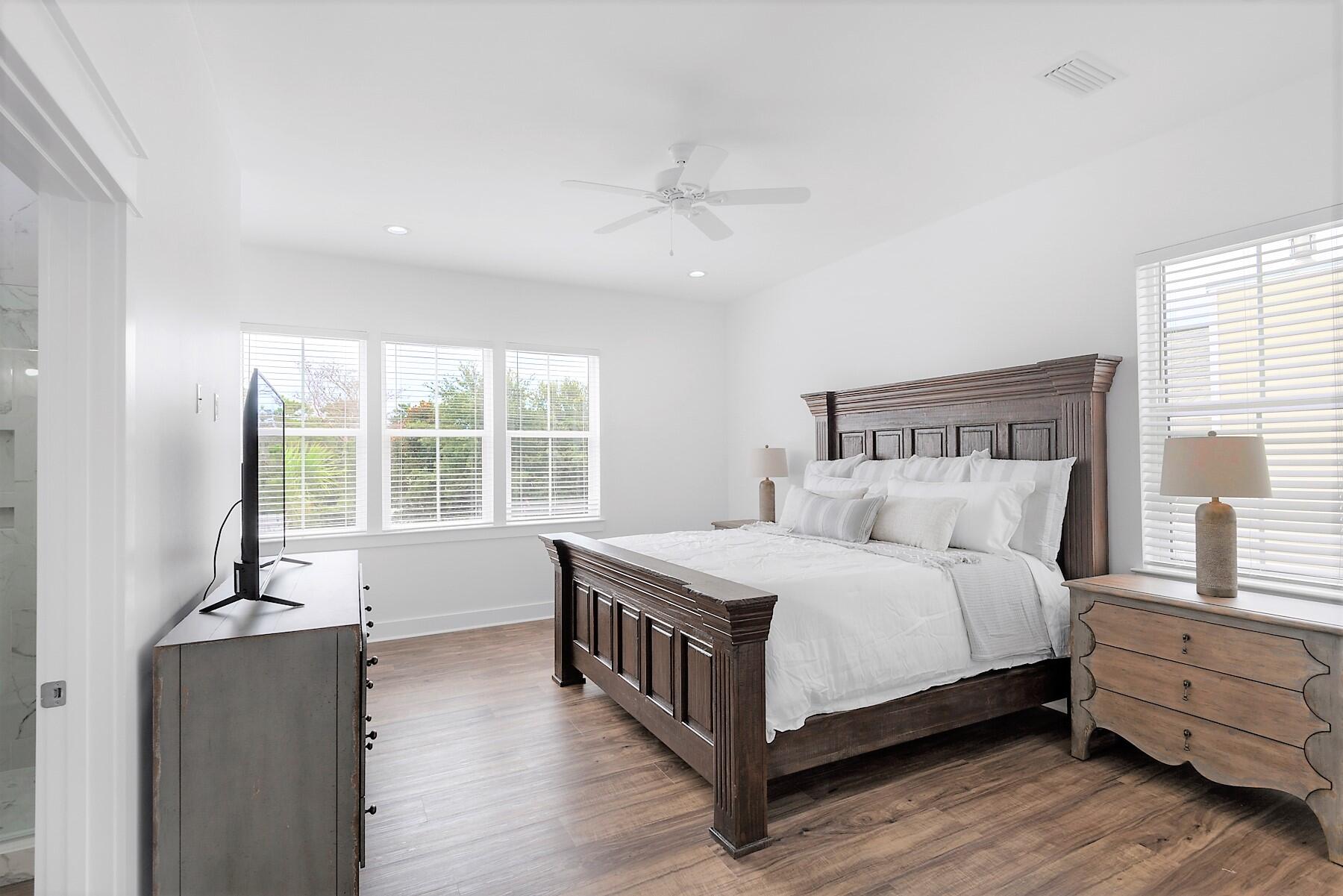 4458 Luke Avenue Destin, FL 32541 - Photo 28 of 41 a bedroom with a bed and window