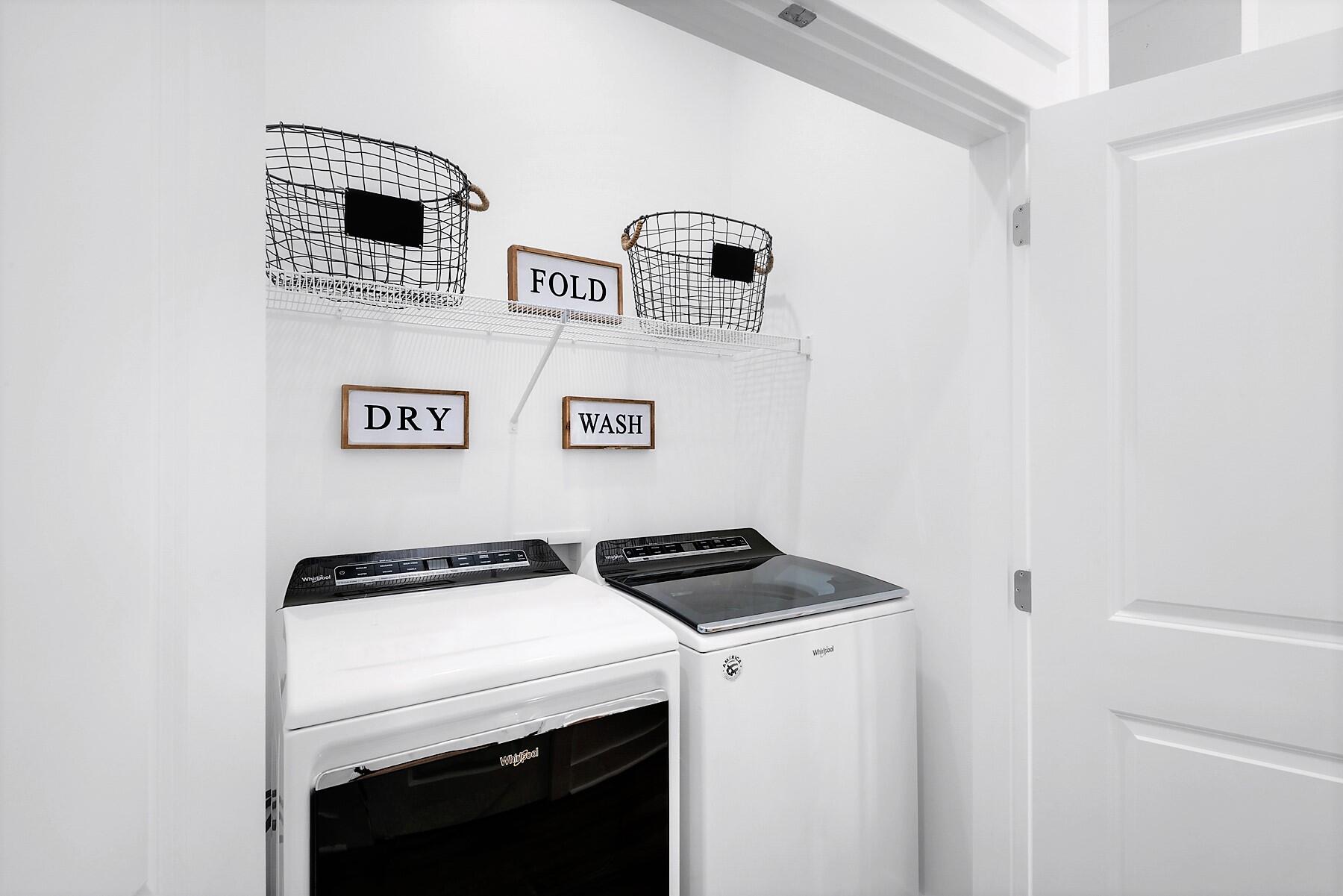 4458 Luke Avenue Destin, FL 32541 - Photo 41 of 41 a utility room with dryer and washer