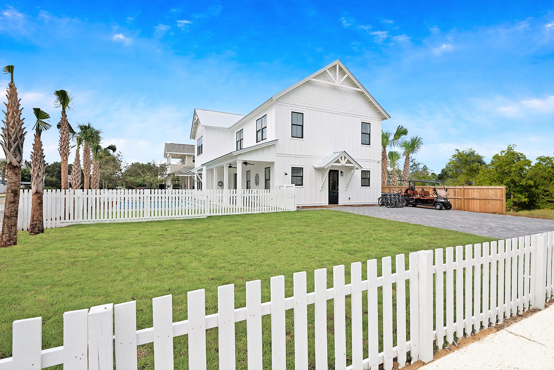 4458 Luke Avenue Destin, FL 32541 - Photo 6 of 41 a front view of a house with a yard