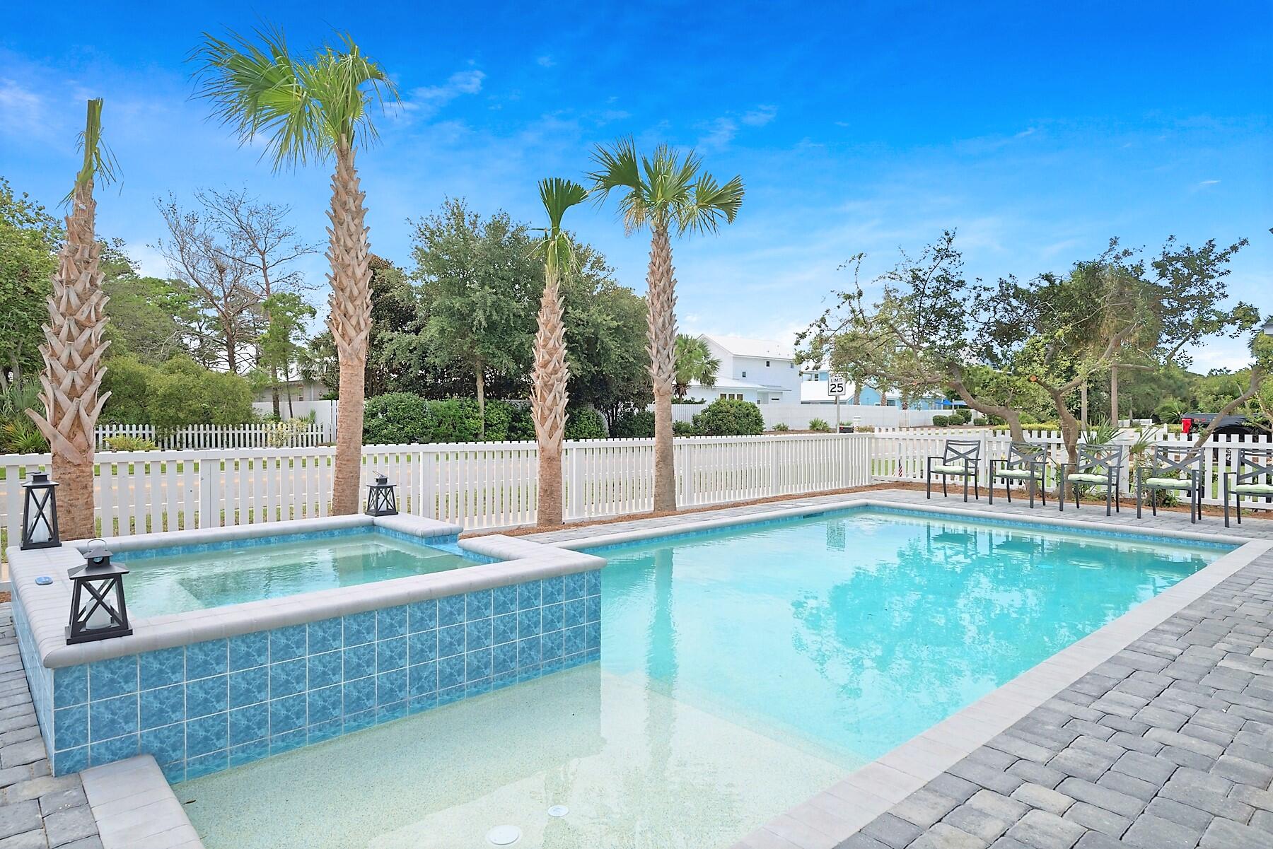 4458 Luke Avenue Destin, FL 32541 - Photo 10 of 41 a view of a swimming pool with a yard