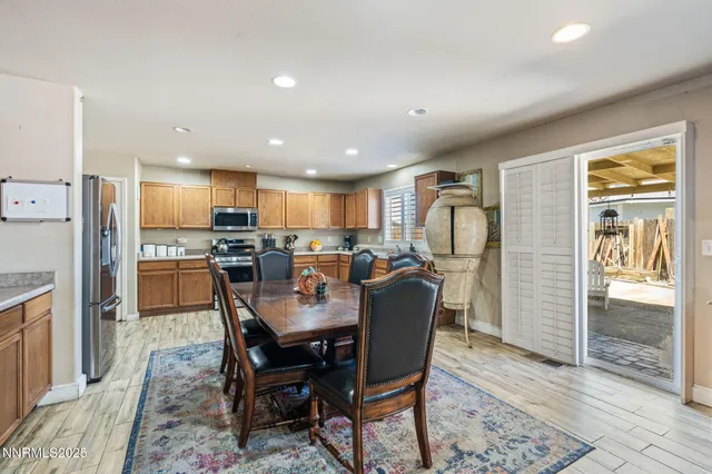 a view of a dining room with furniture
