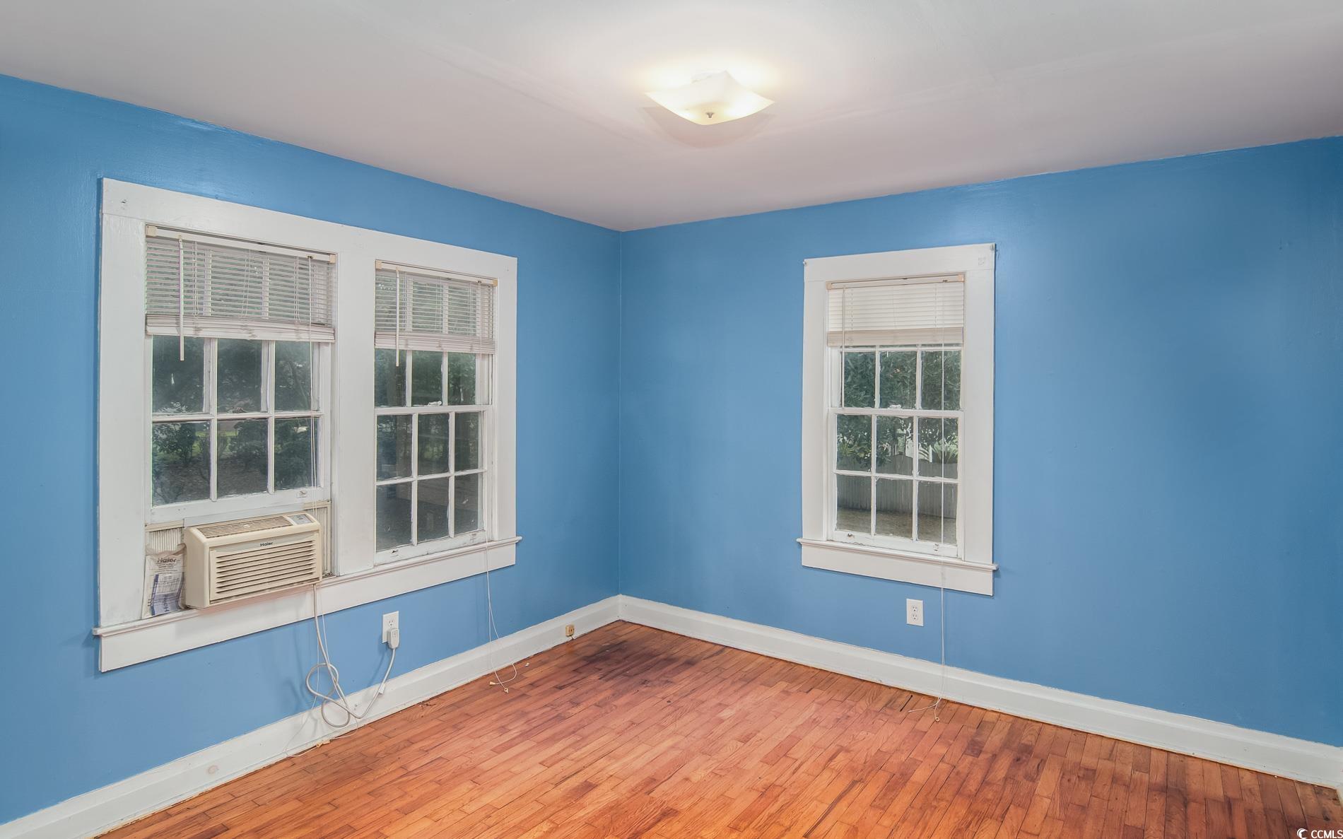 1010 Highmarket Street Georgetown, SC 29440 - Photo 30 of 32 Spare room featuring baseboards and wood finished floors